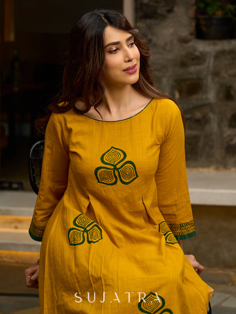 Contemporary Mustard Floral Hand Block Print Dress featuring Front & Back Box Pleat with Geometric Border on Hem & Sleeves