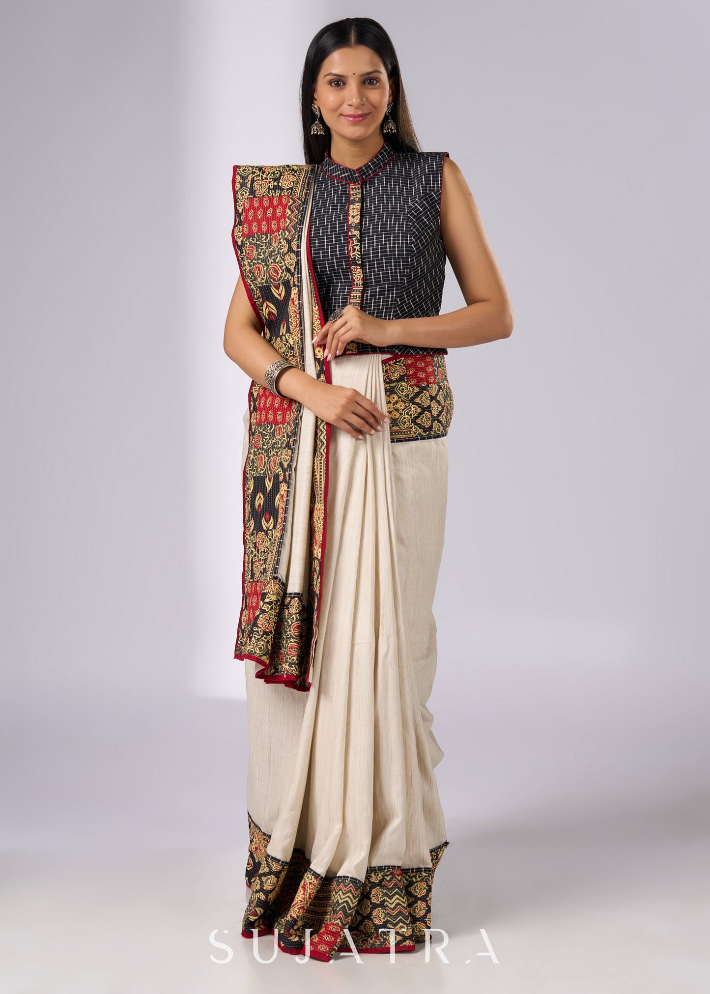 Stylish off white cotton saree with patch work prints & hand painted motifs