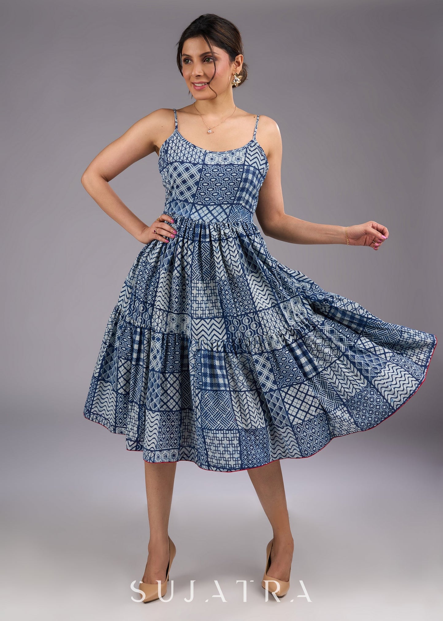 Chic indigo hand-block printed midi dress with delicate straps and a flowy tiered silhouette