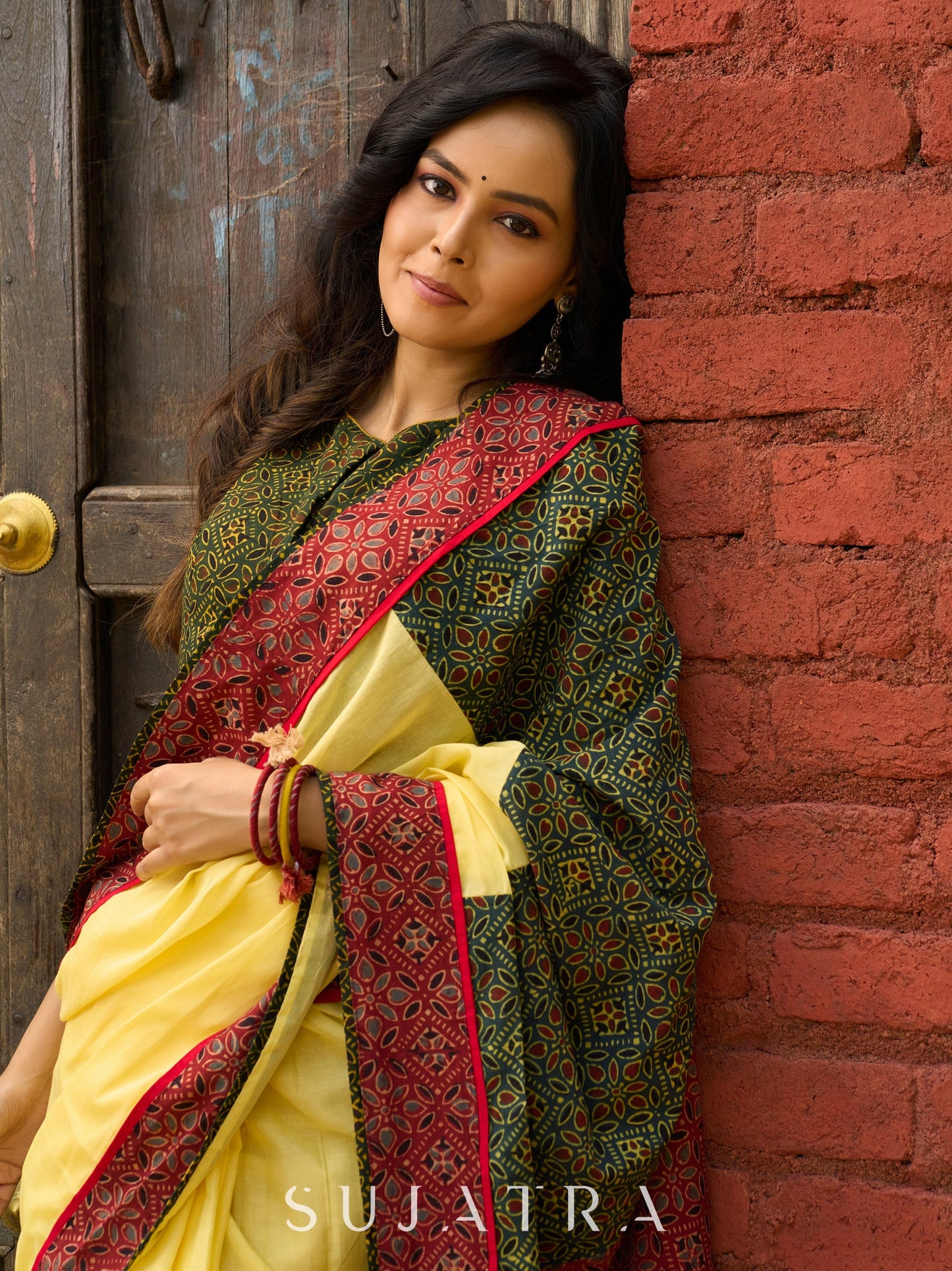Sunlit yellow cotton contemporary Ajrakh combination saree