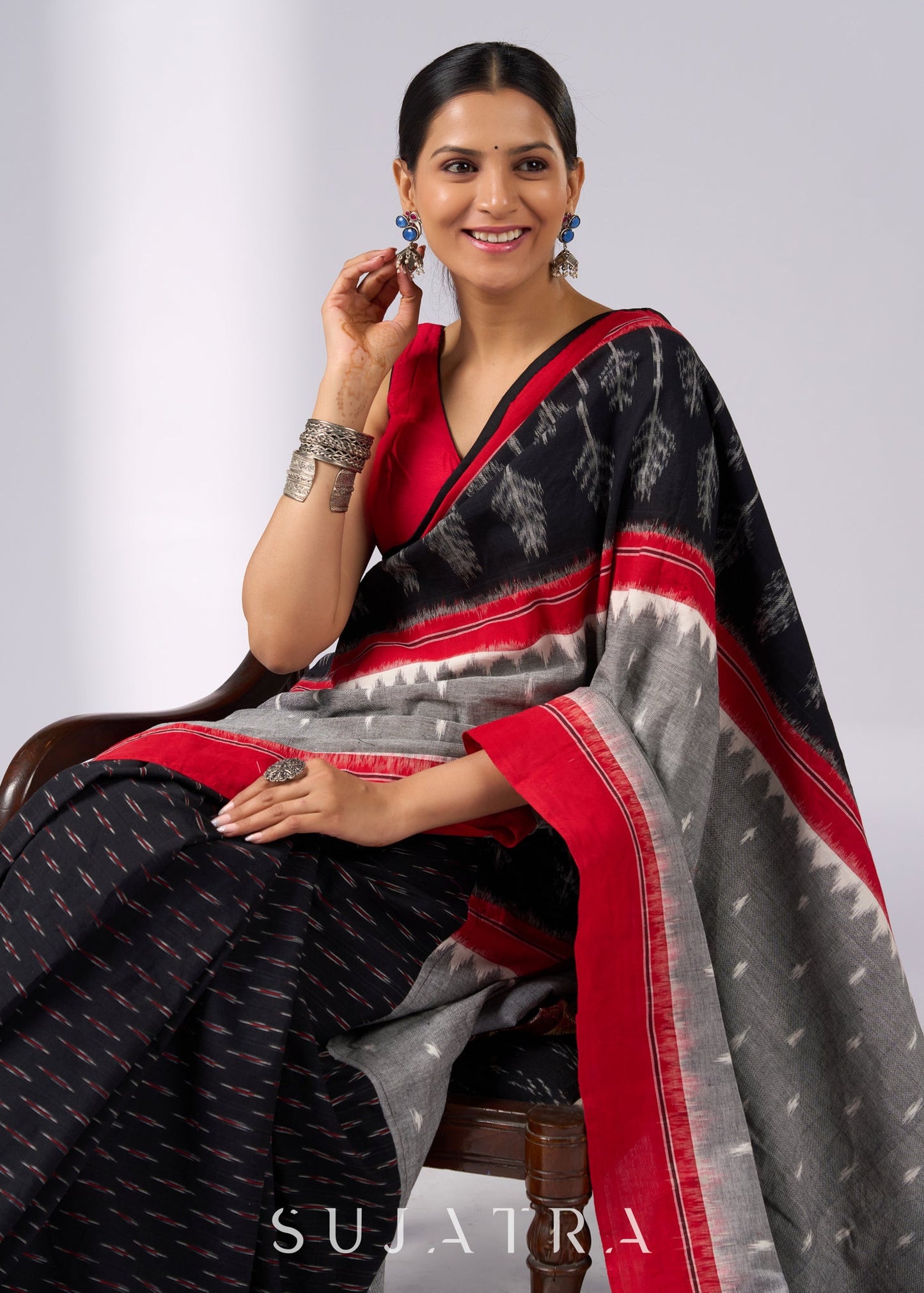 Sophisticated black & red combination Ikat saree