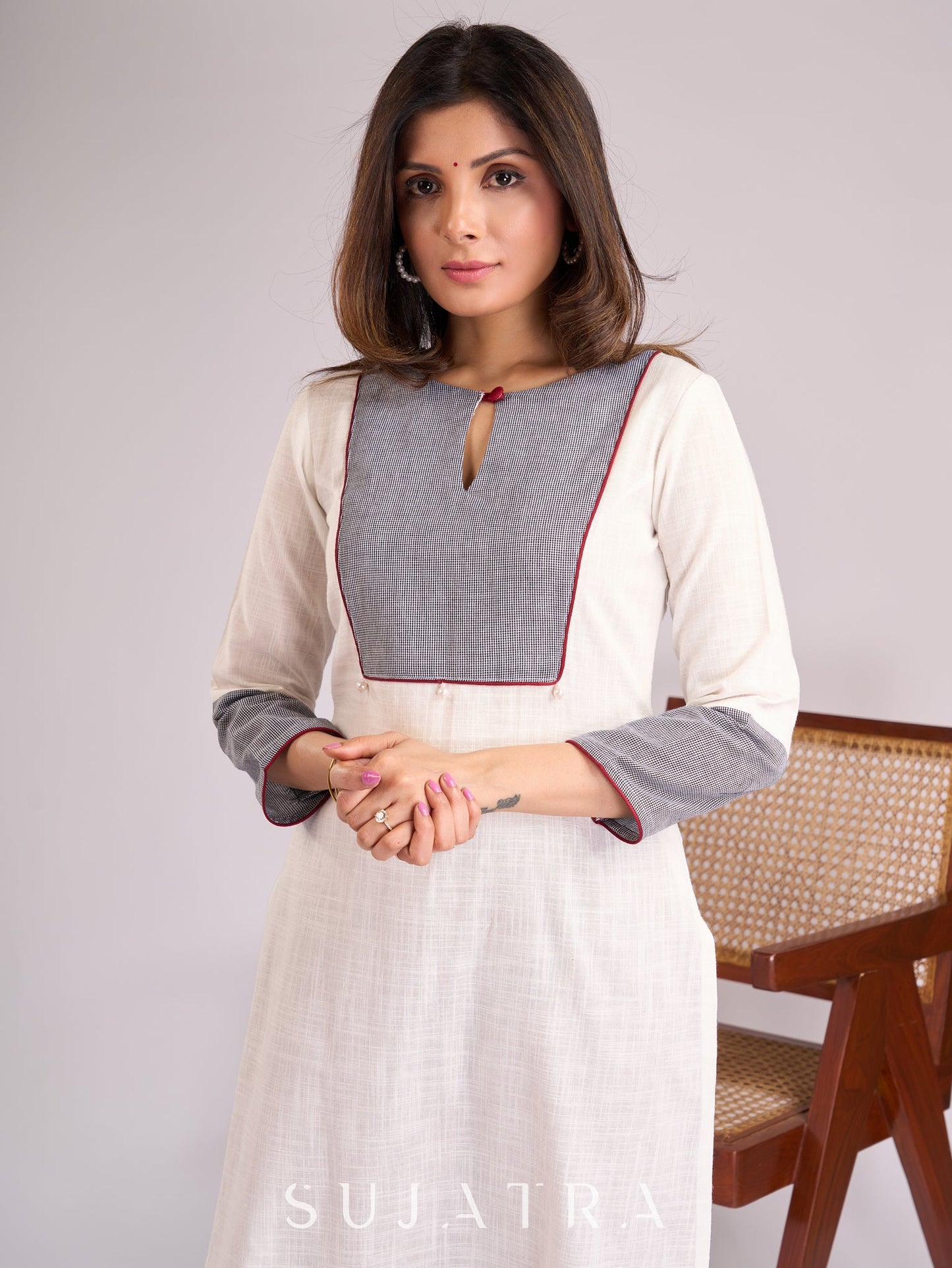 Graceful White Cotton Kurta with Checkered Yoke & Cuffs, Maroon Piping & Pearl Embellishments