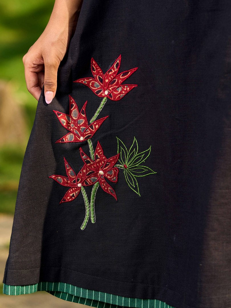 Chic Black Cotton Dress With Handcrafted Red Floral Applique And Contrast Green Detailing