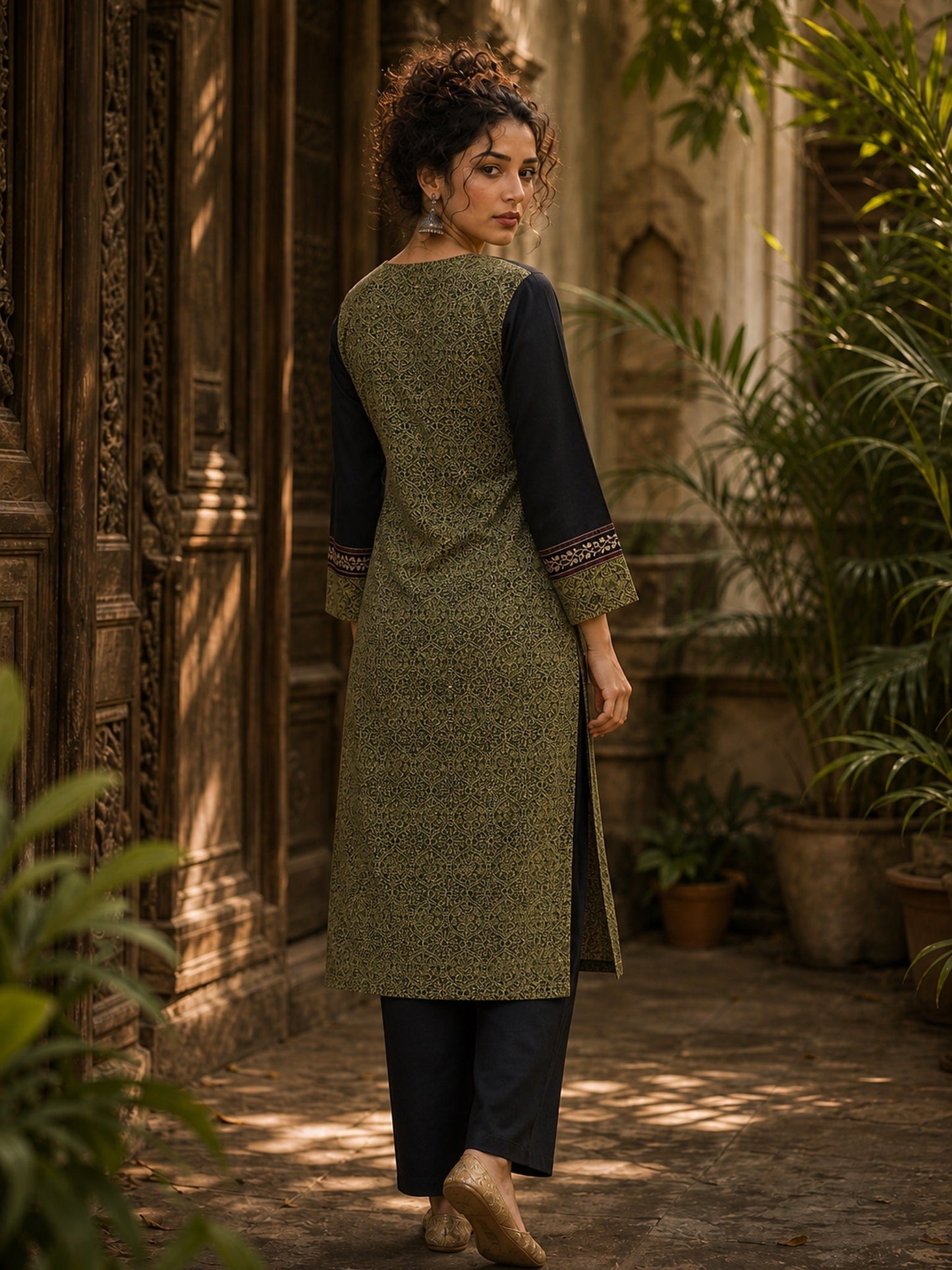 Regal Olive Ajrakh Print Kurta with Black Contrast Sleeves & Coordinated Ajrakh Border Detailing