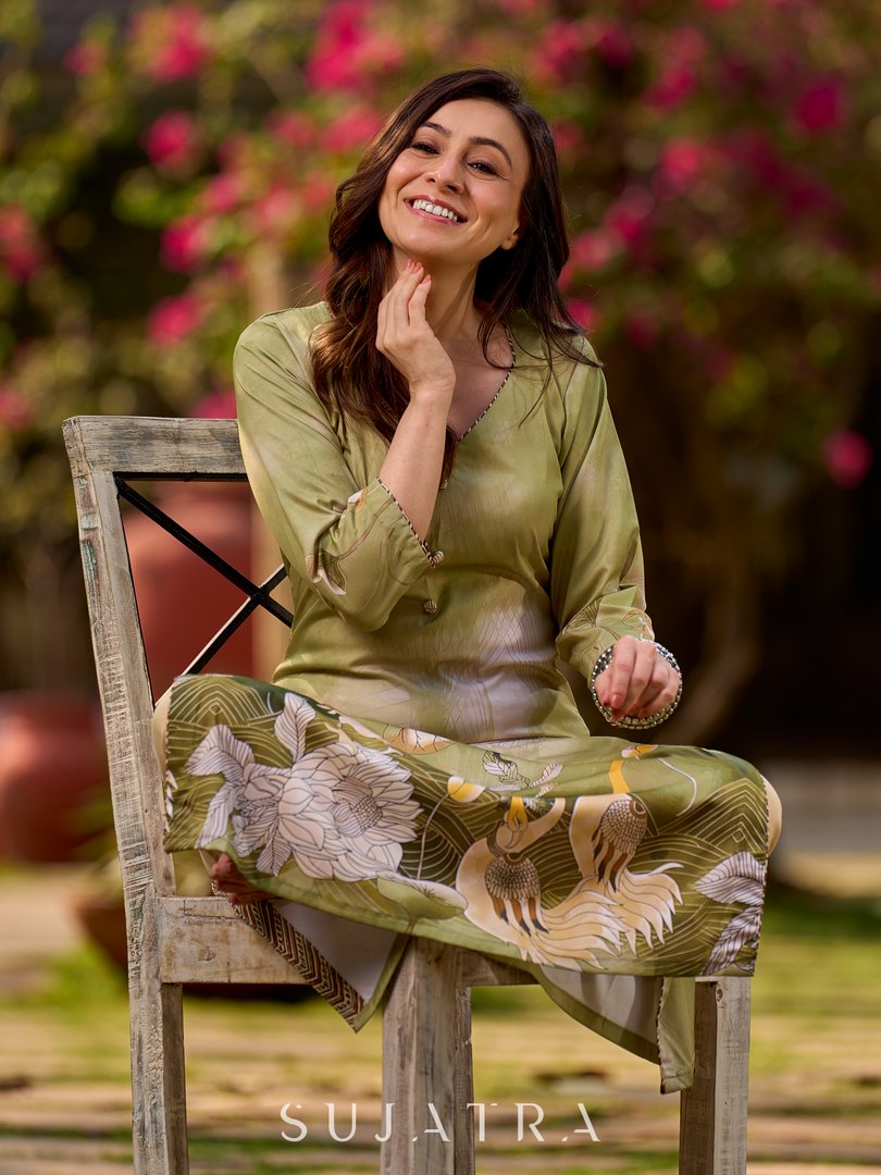 Ethereal soft green ombré kurta adorned with swan-inspired motifs