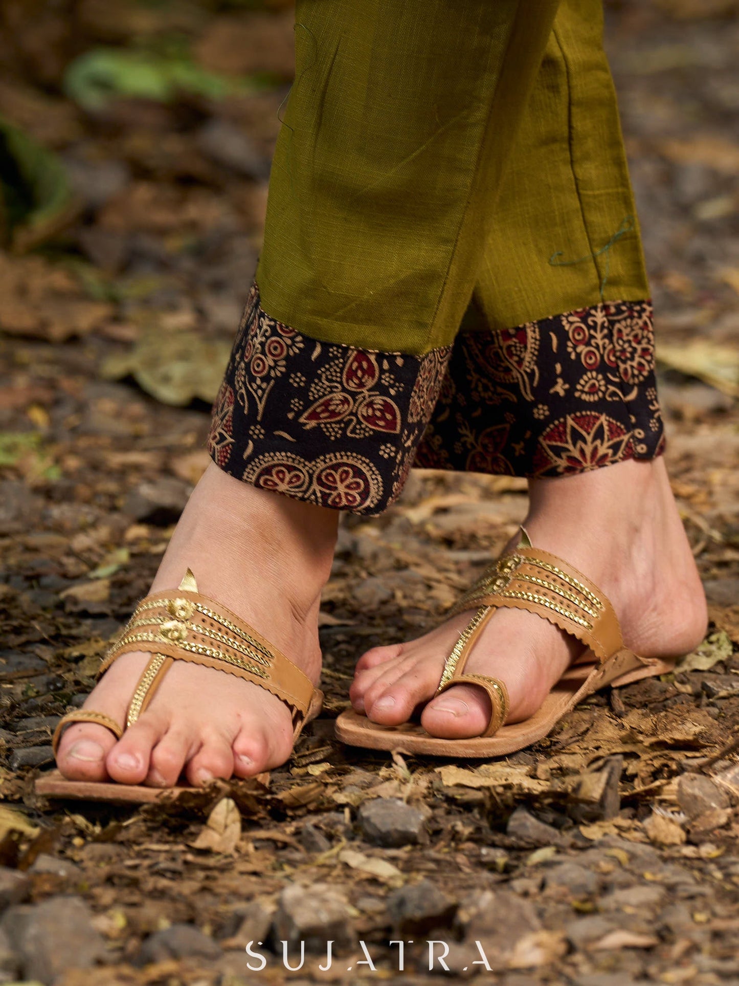 Olive kurta elevated with a black Ajrakh centre panel and Maroon details