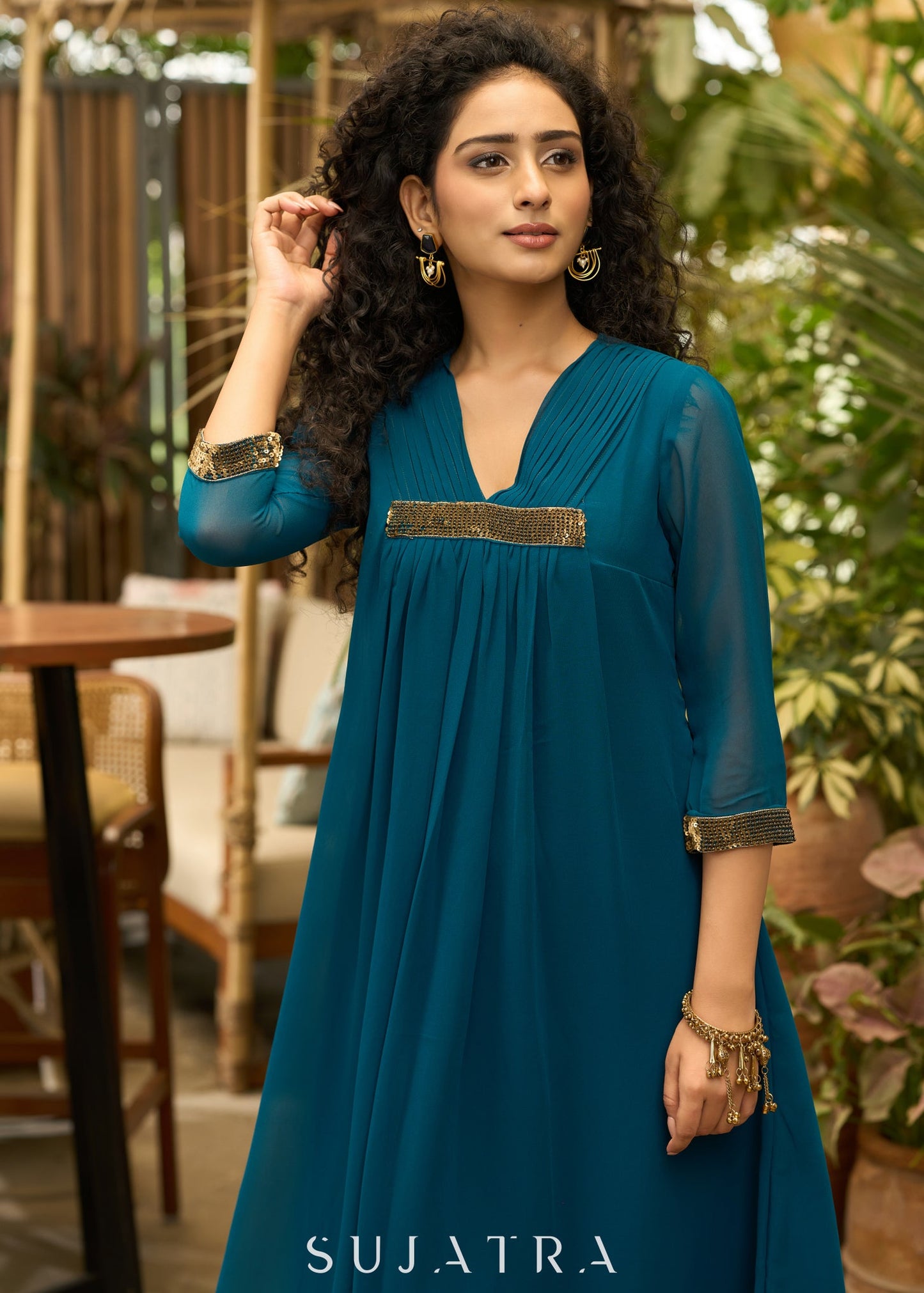 Exclusive turquoise georgette front pleated Co ord set with gold sequence work