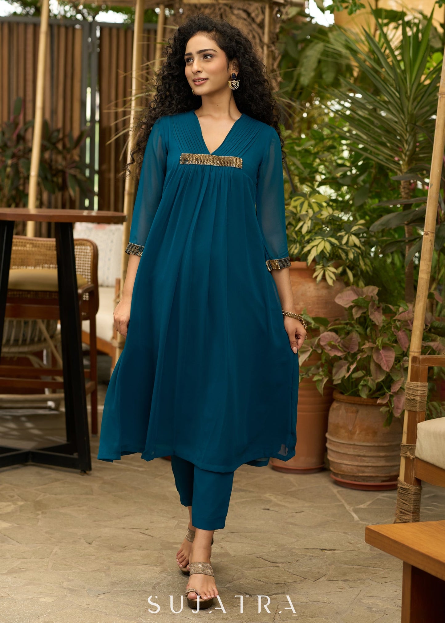 Exclusive turquoise georgette front pleated Co ord set with gold sequence work