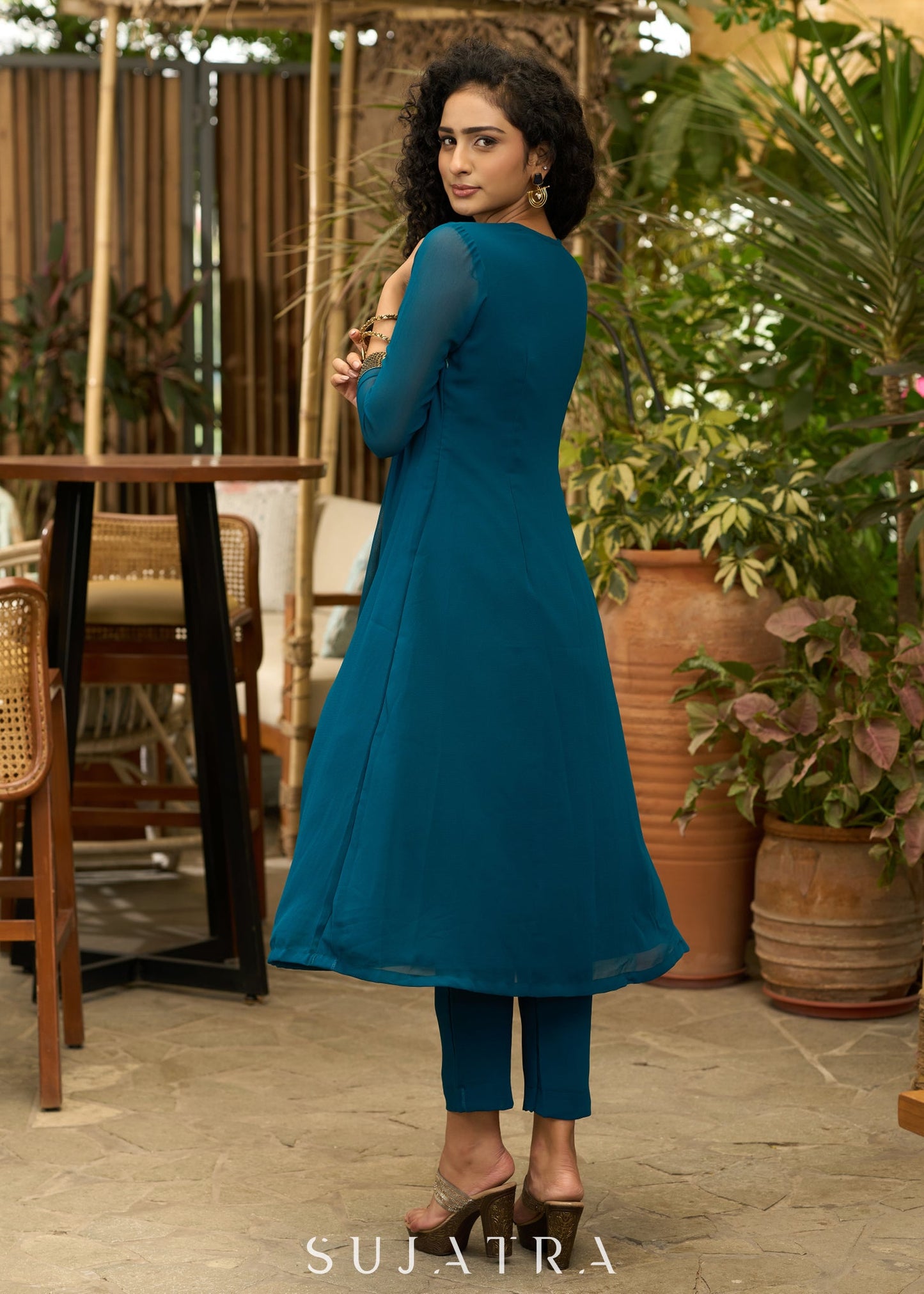 Exclusive turquoise georgette front pleated Co ord set with gold sequence work