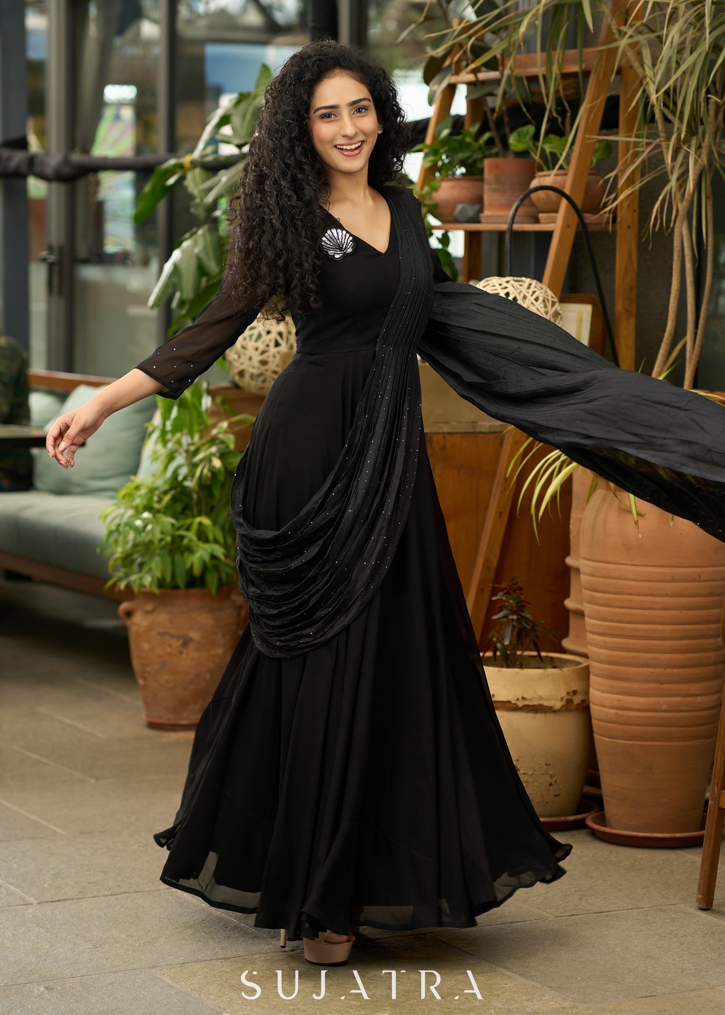 saree and dress Trendy black georgette saree gown with self embroidered pallu