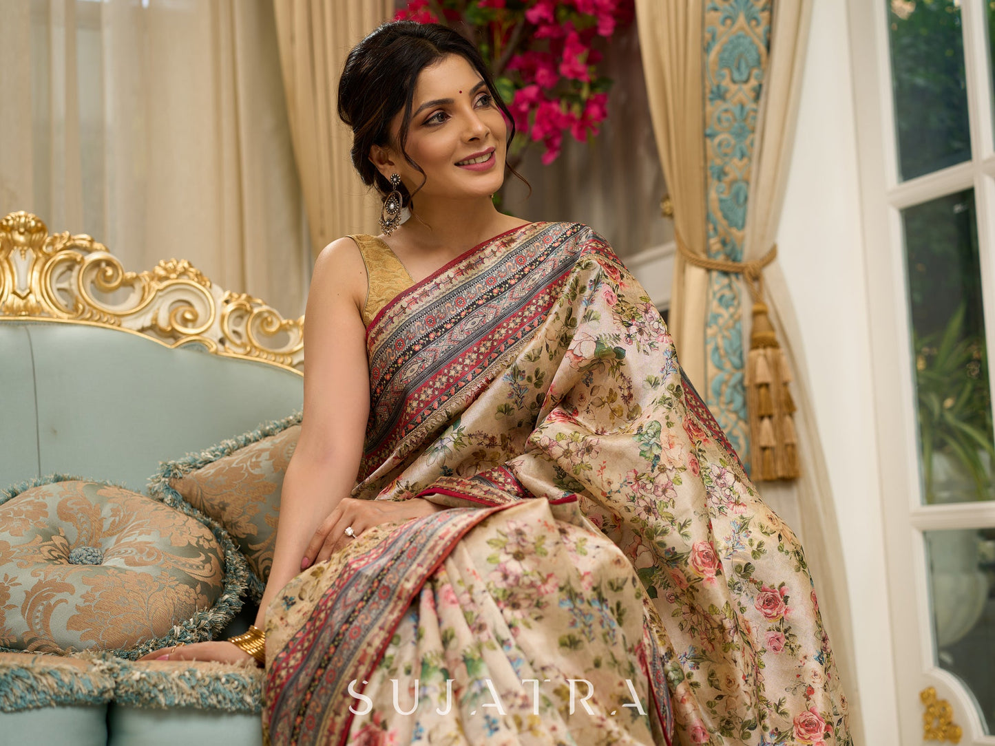 Graceful floral printed saree with intricate border, ideal for weddings and celebrations