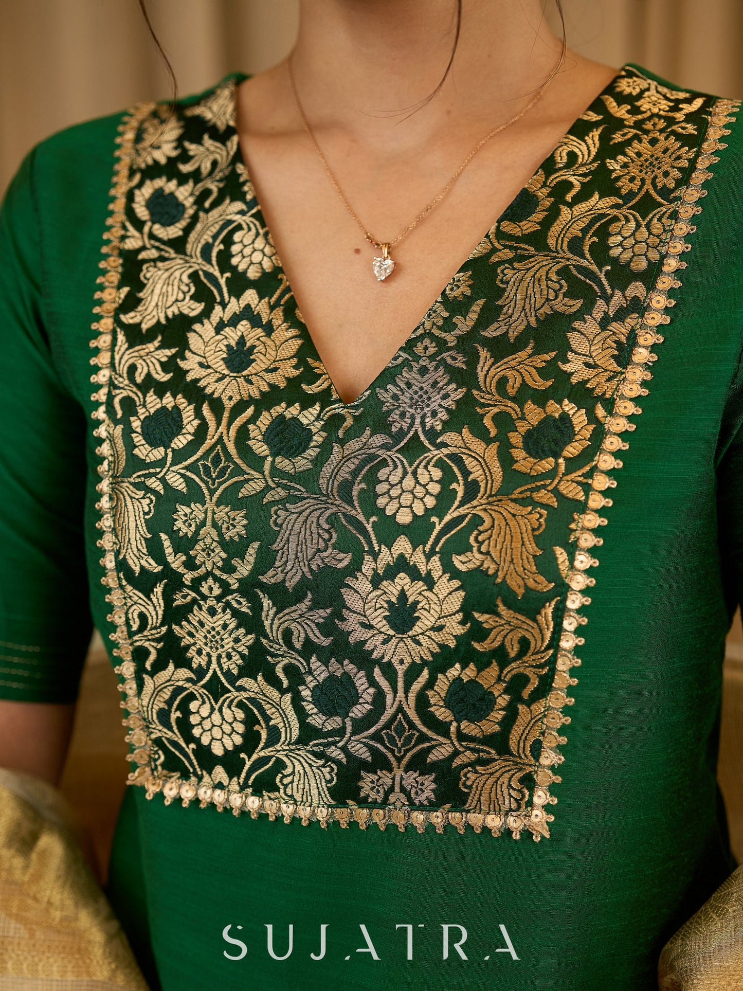 A traditional look featuring a red Cotton silk lehenga with a green Cotton silk choli with brocade yoke - Contrast dupatta optional