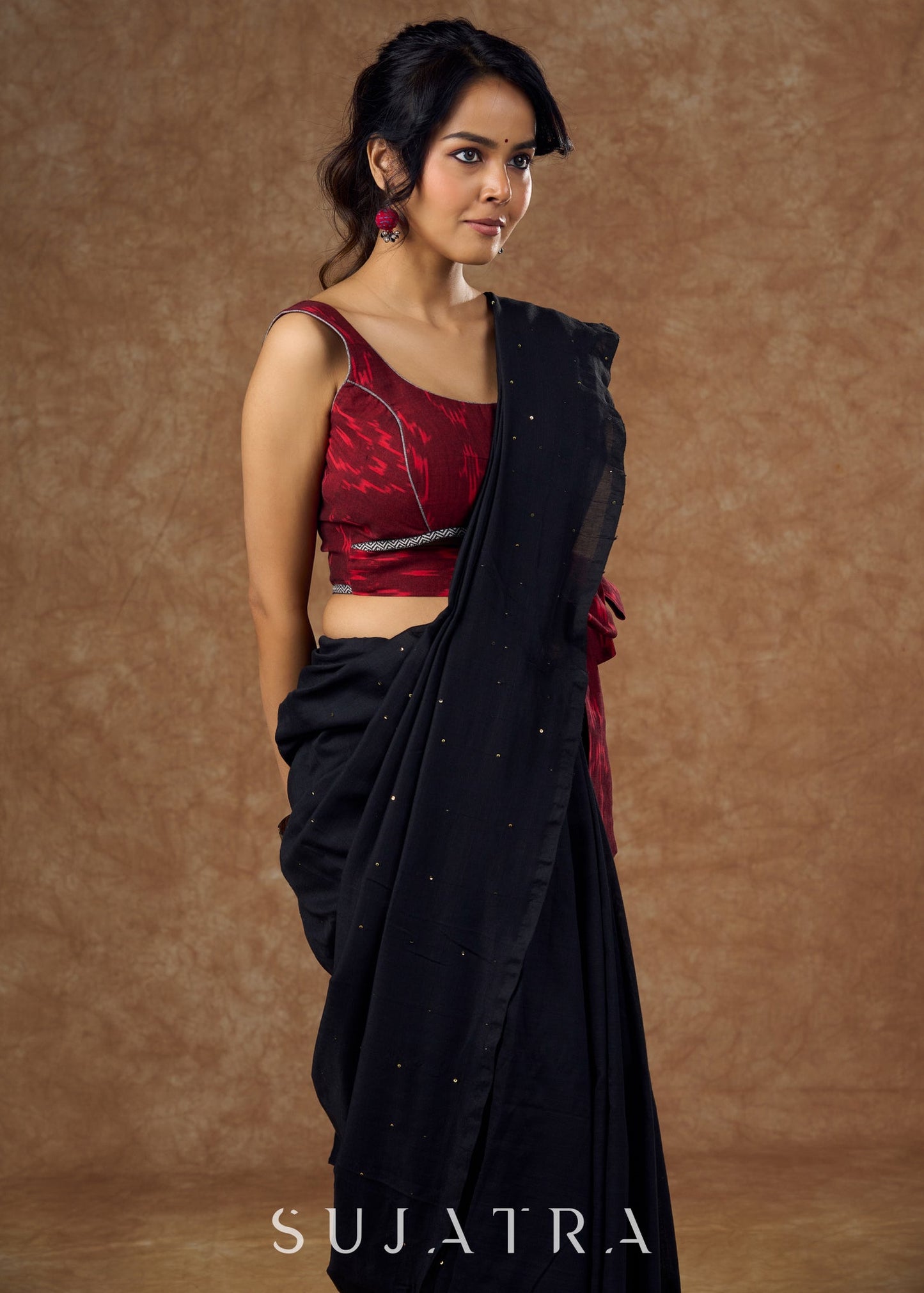 Cotton Ikat blouse with bold red patterns & tie-up waist detail