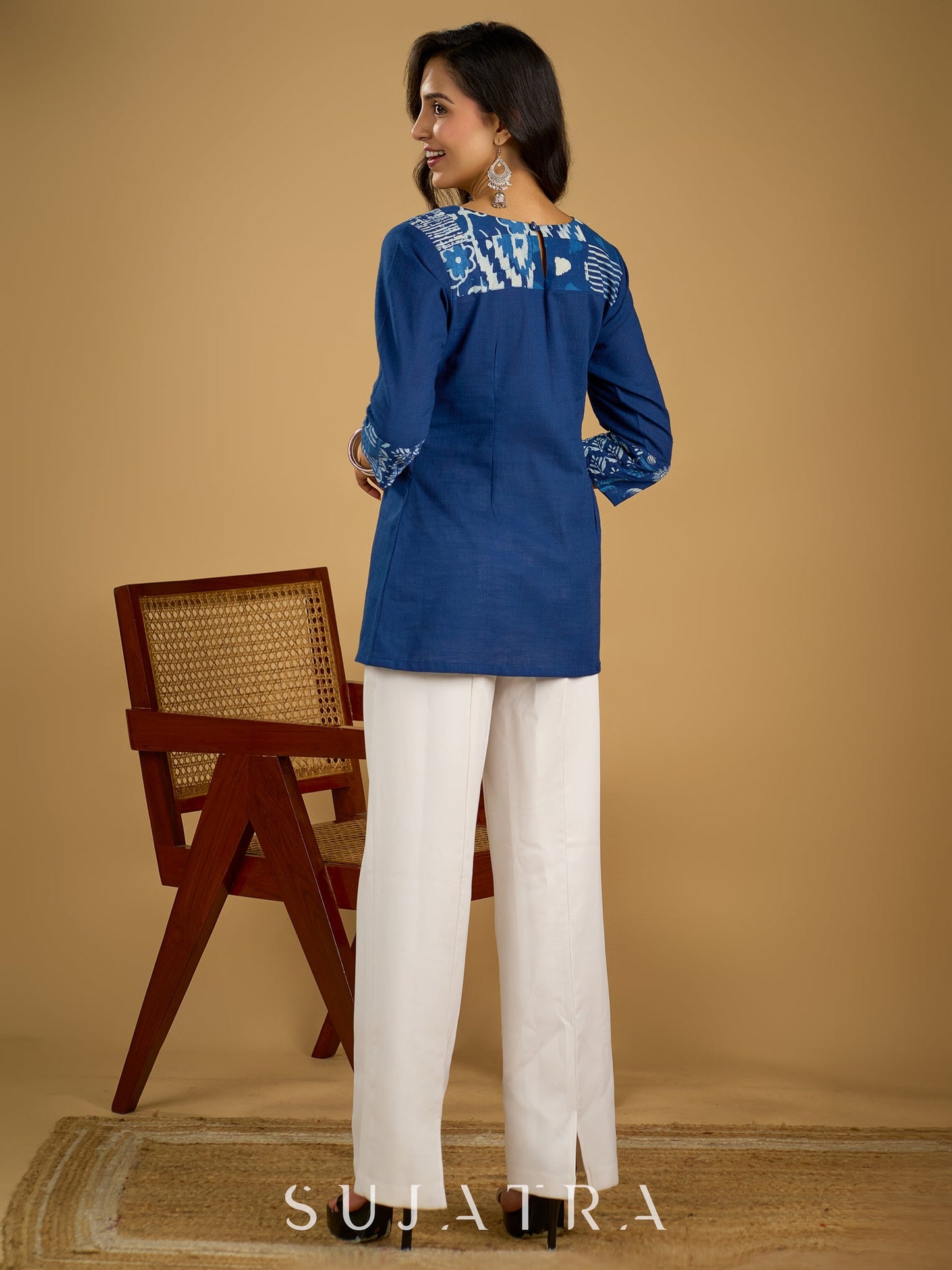 Classic indigo cotton patchwork top with subtle pearl highlights