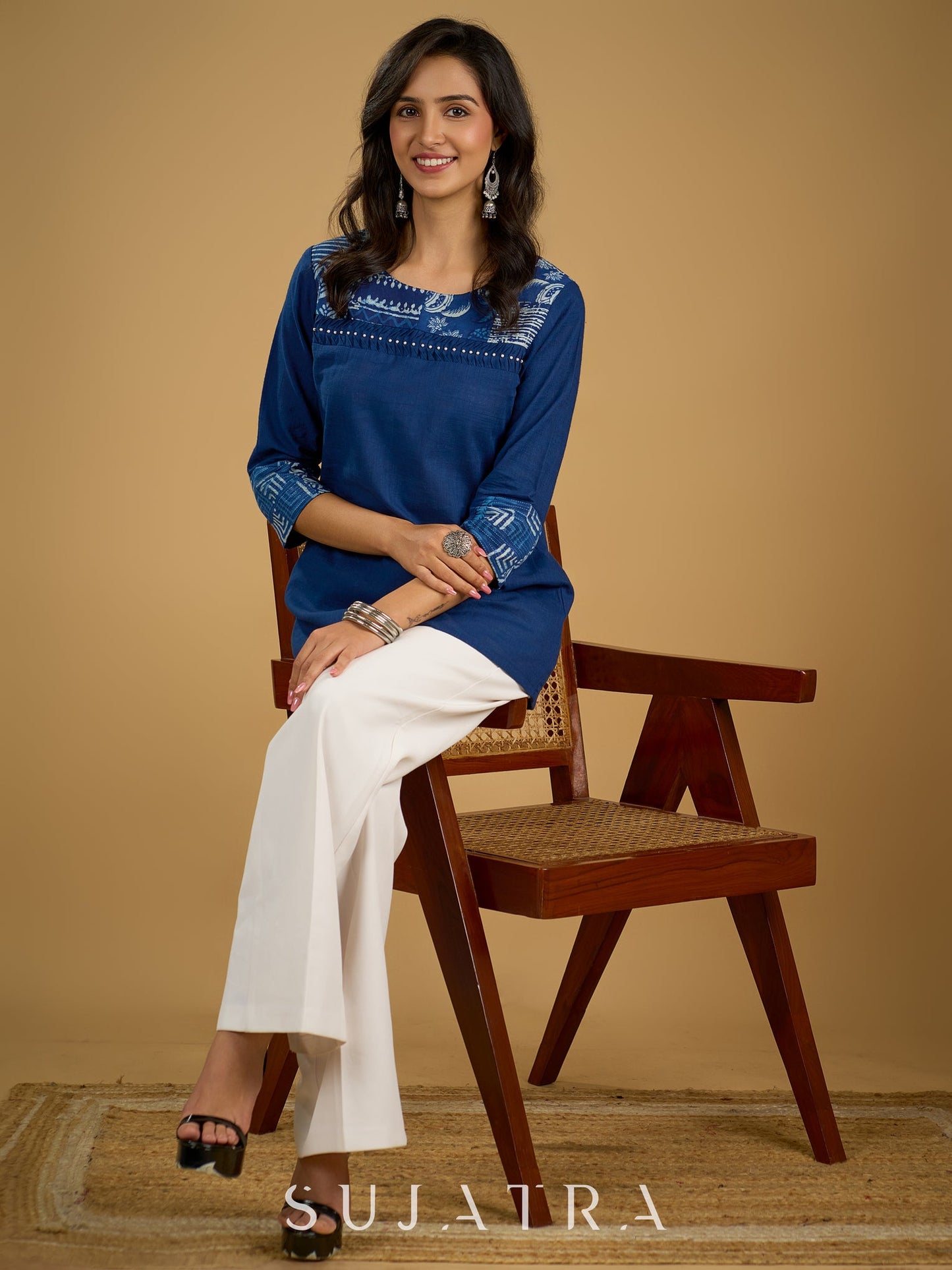 Classic indigo cotton patchwork top with subtle pearl highlights