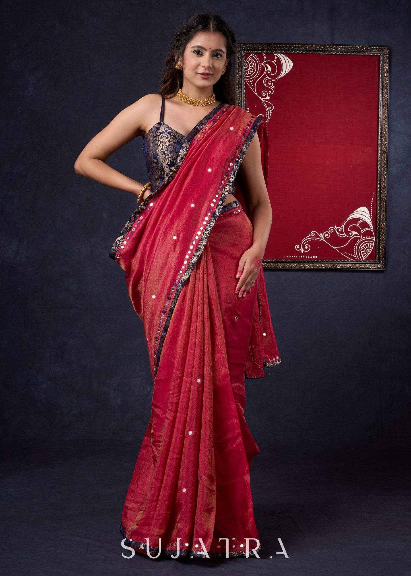 Mesmerizing Tissue Saree with all-over mirror work detailing highlighted with Banaseri Border