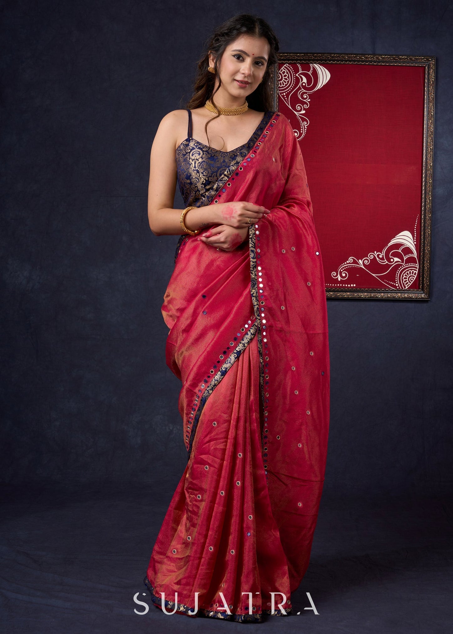 Mesmerizing Tissue Saree with all-over mirror work detailing highlighted with Banaseri Border