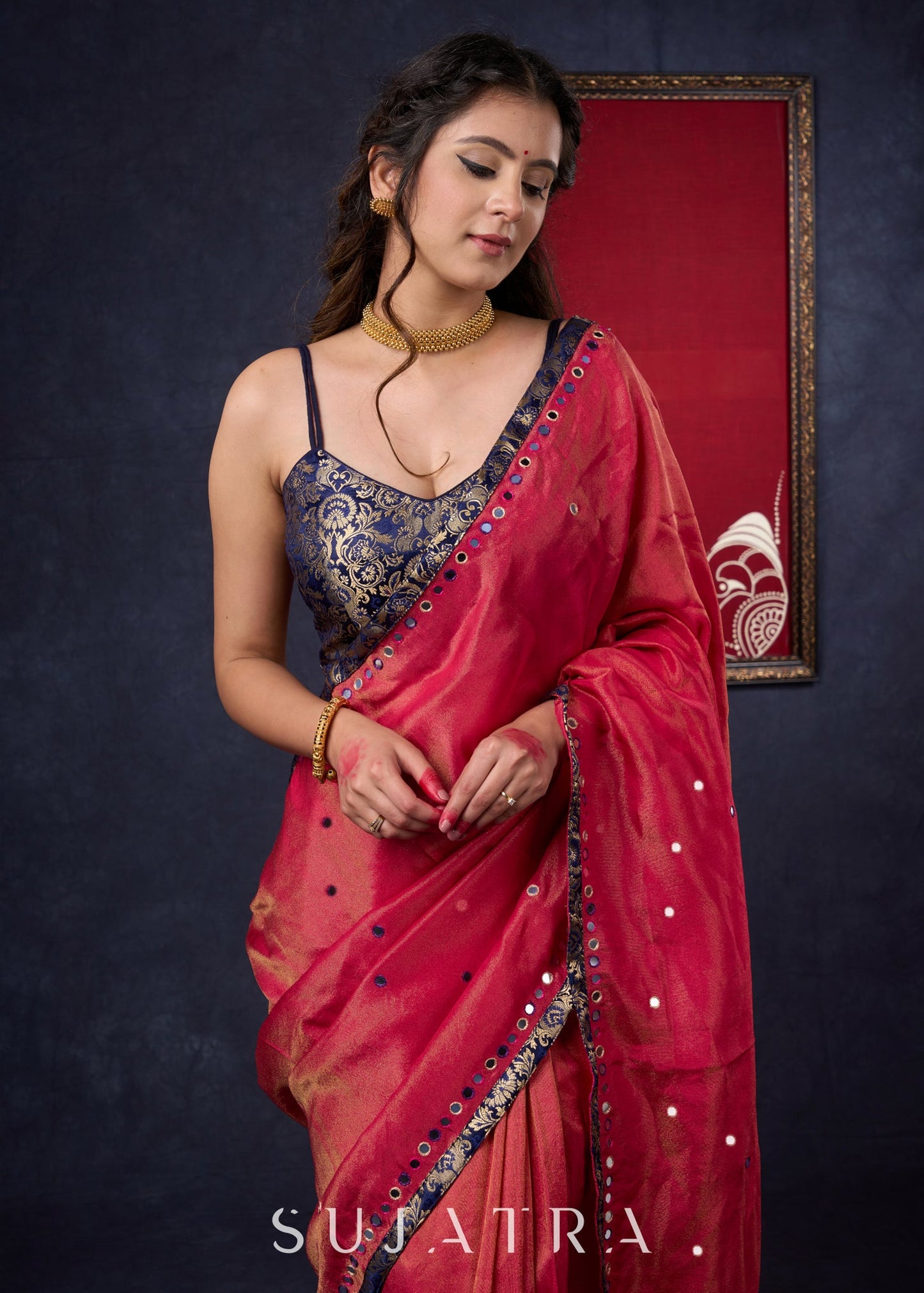 Mesmerizing Tissue Saree with all-over mirror work detailing highlighted with Banaseri Border