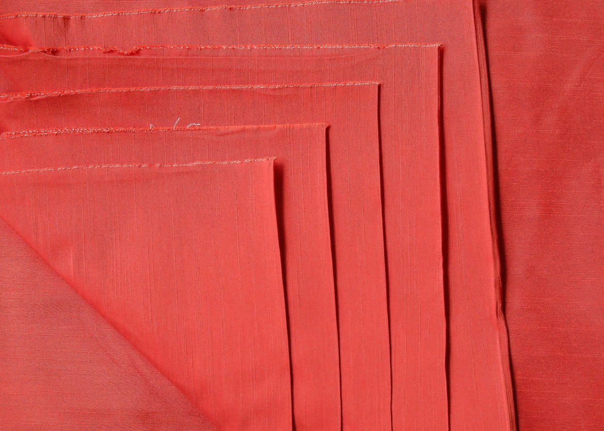 Tissu en coton flammé et soie rouge uni