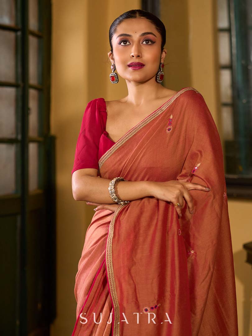Warm Rust Saree with Fine Butti Embroidery and Classic Border Finish