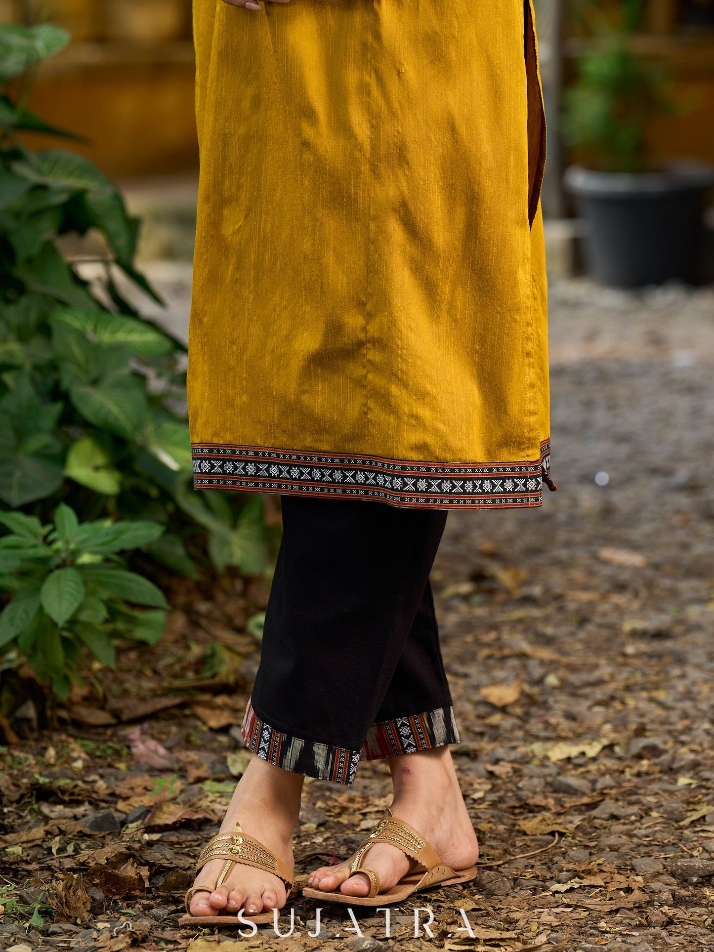 Stunning mustard cotton-silk kurta highlighted with black Ikat