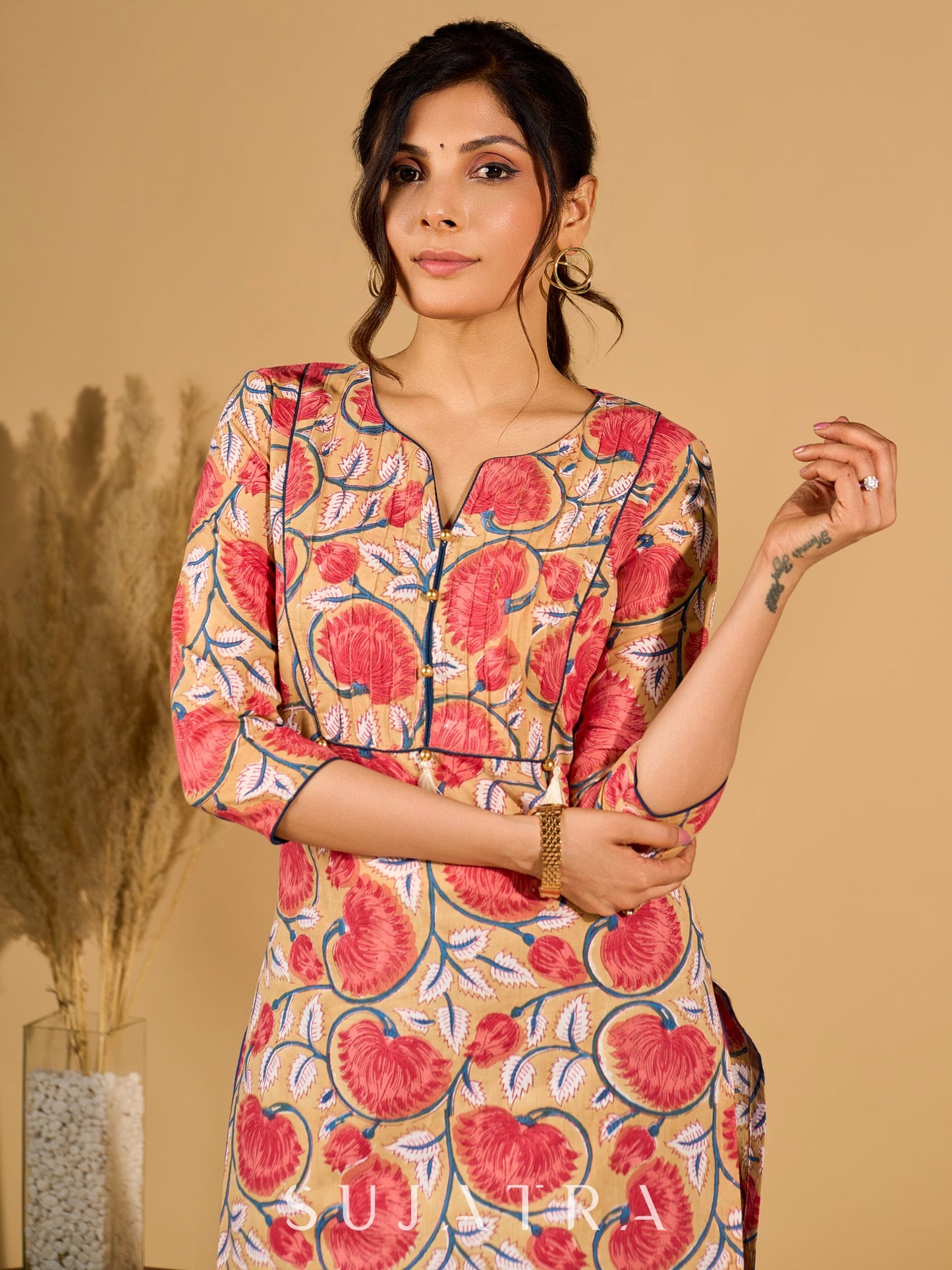 Classic Cream Mul Cotton Printed Kurta with Playful Tassels and Piping