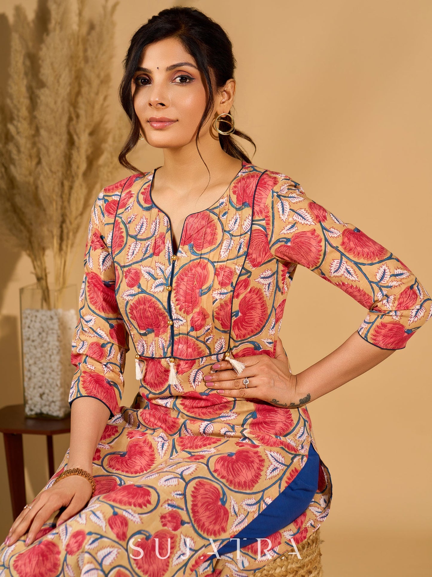 Classic Cream Mul Cotton Printed Kurta with Playful Tassels and Piping