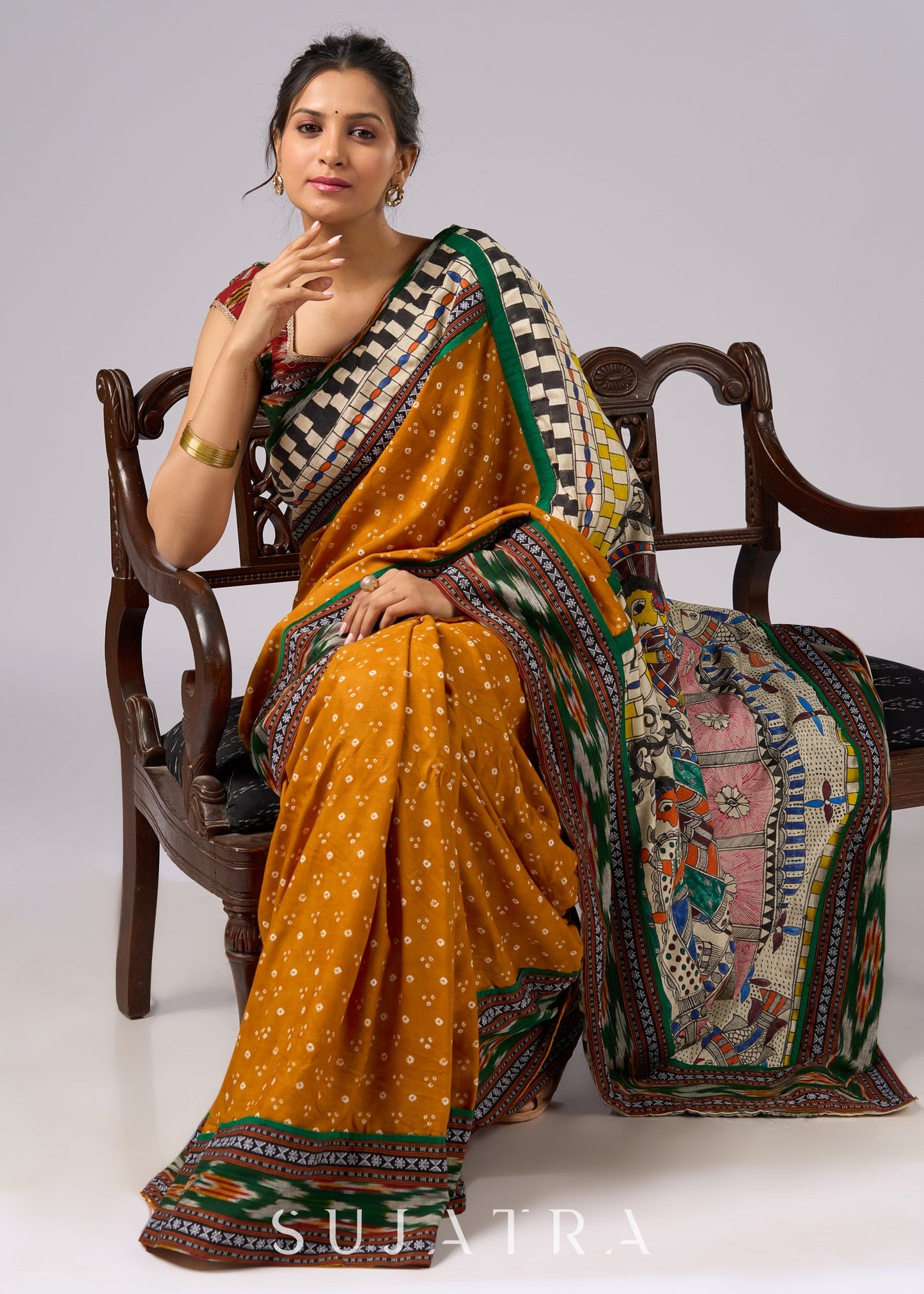 Vibrant yellow Bandhni print rayon saree with hand painted Madhubani art