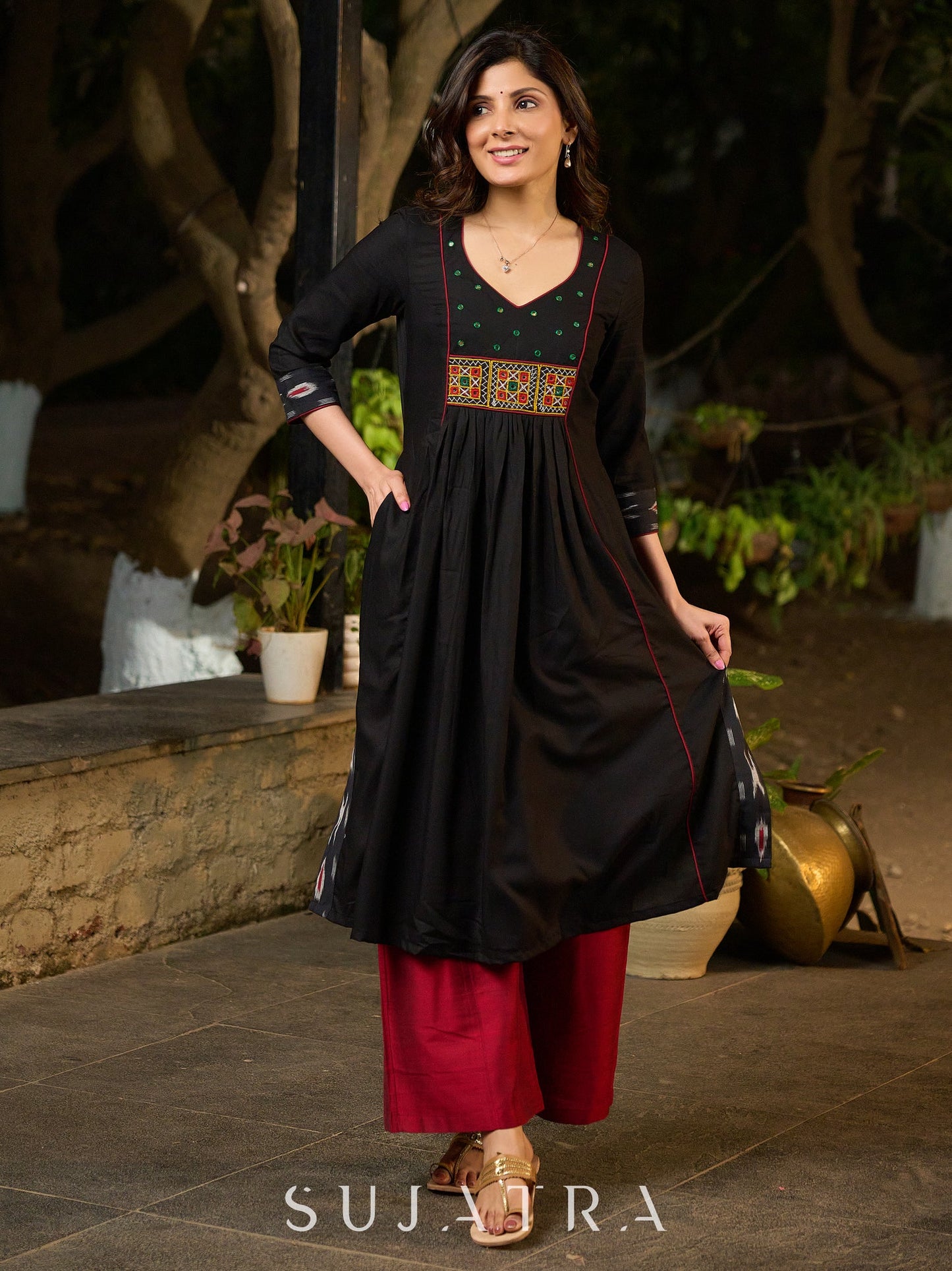 Black Cotton Panel Kurta with Ikat Accents in Sleeves and Flare, Embellished with Delicate Mirrors