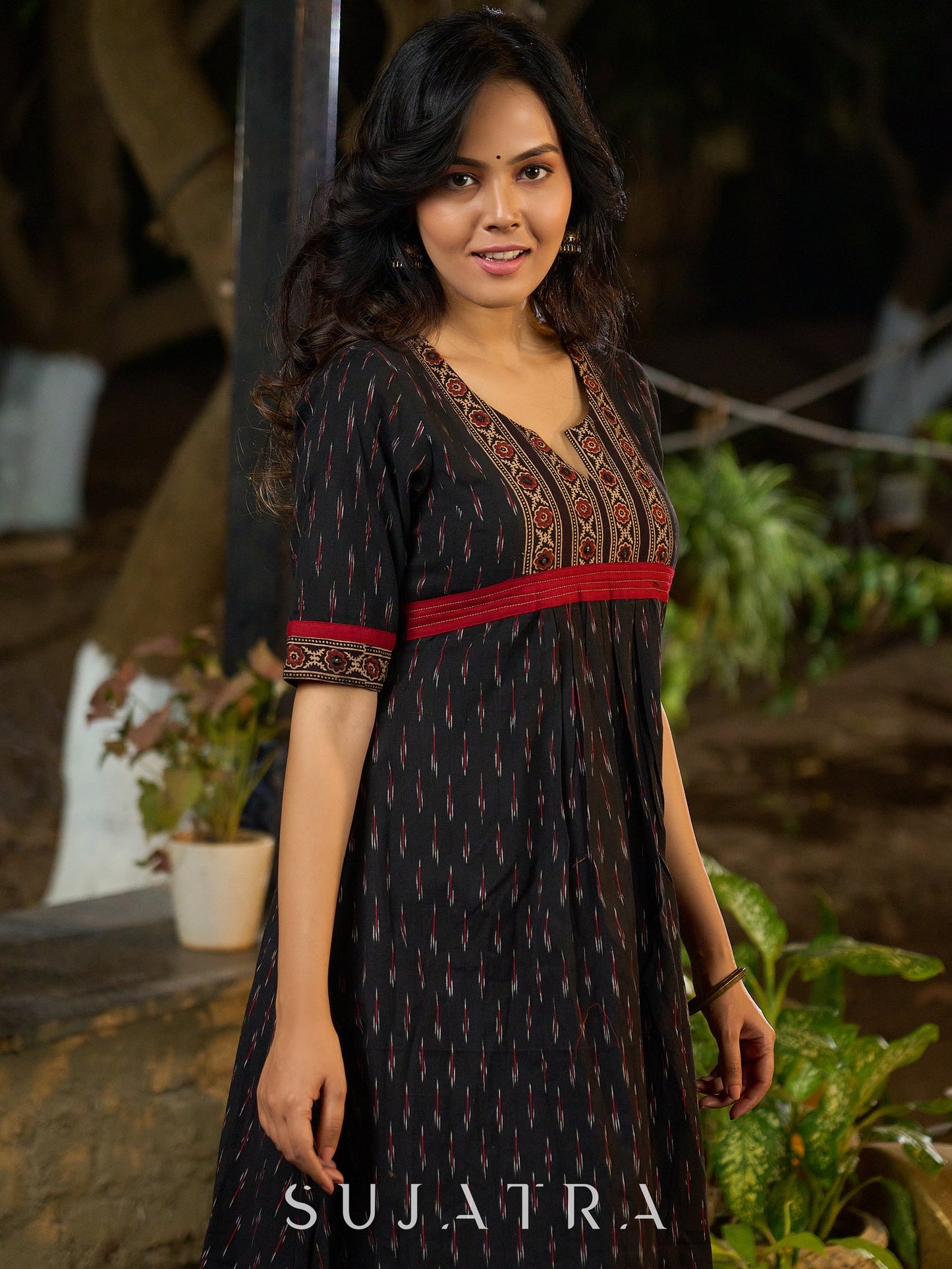 Black Ikat Weave Kurta Featuring Artisan Ajrakh Yoke
