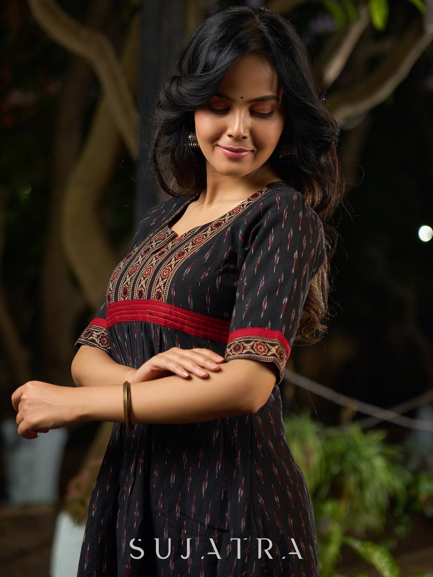 Black Ikat Weave Kurta Featuring Artisan Ajrakh Yoke