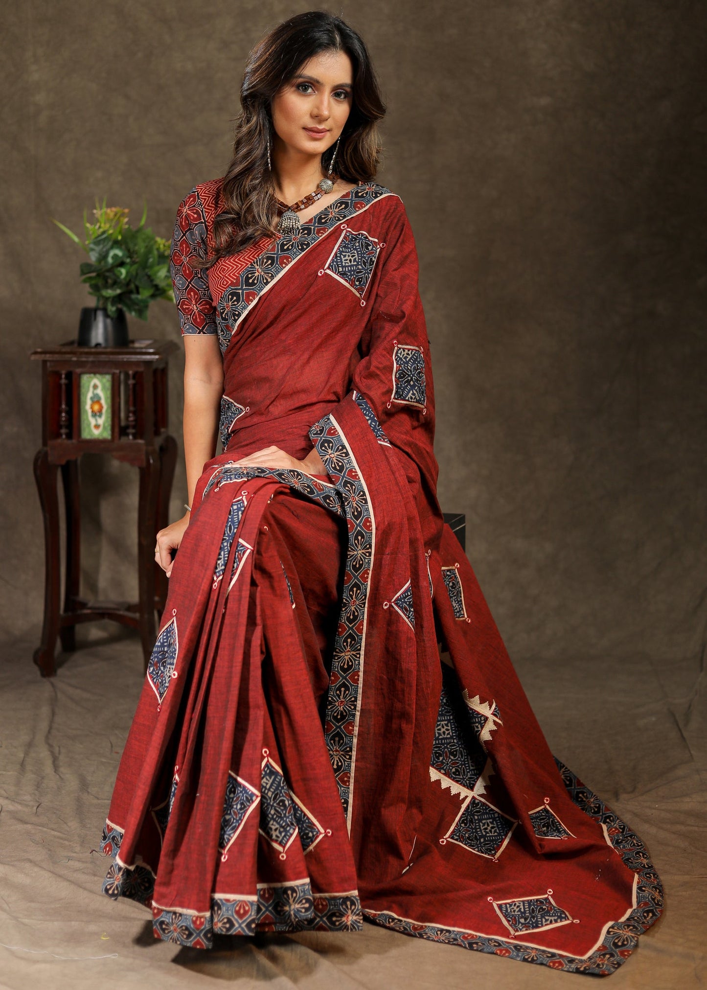 Maroon Handloom saree with Ajrak applique work and border