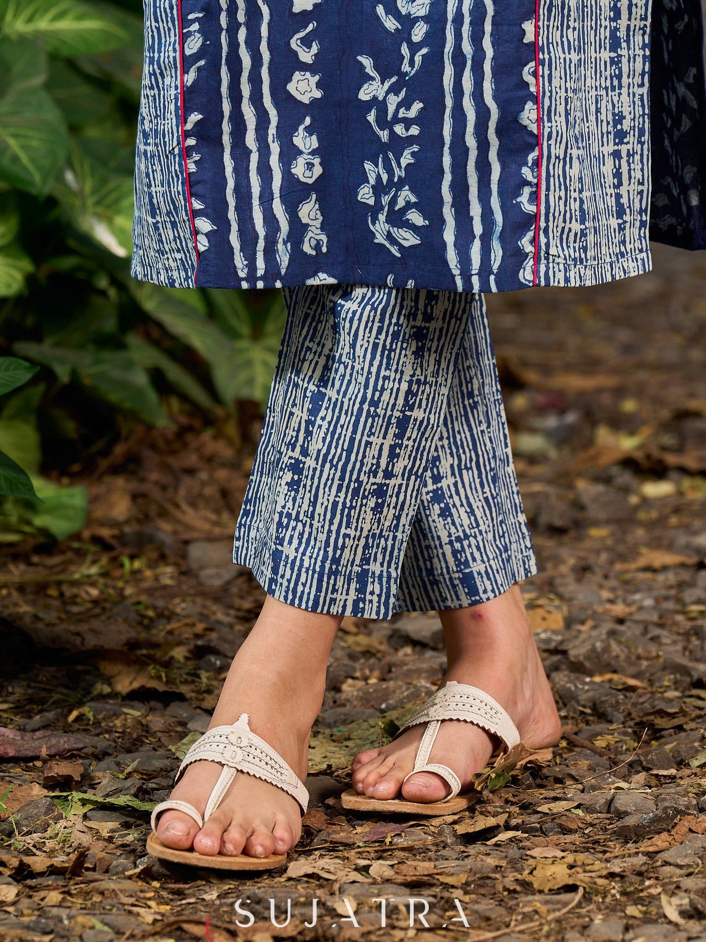 Indigo kurta elevated with delicate pink piping and buttons