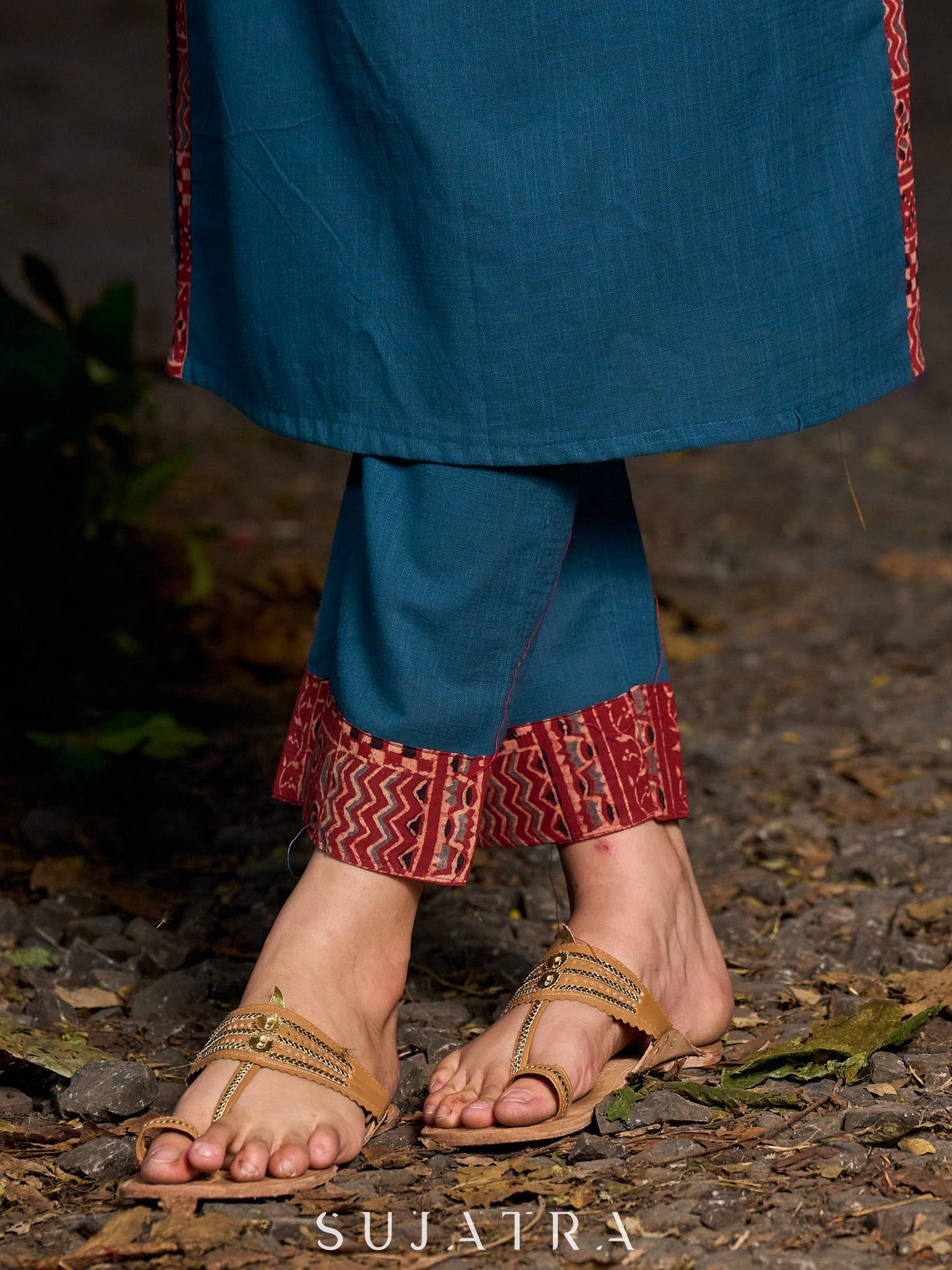 Teal kurta with contrasting Ajrakh sleeves and a chic neck cut