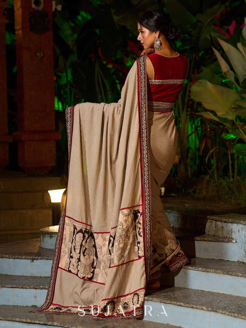 Striking Beige Kalamkari Print Saree with Striped Border & Mythological Motifs and Ajrakh Border Trim