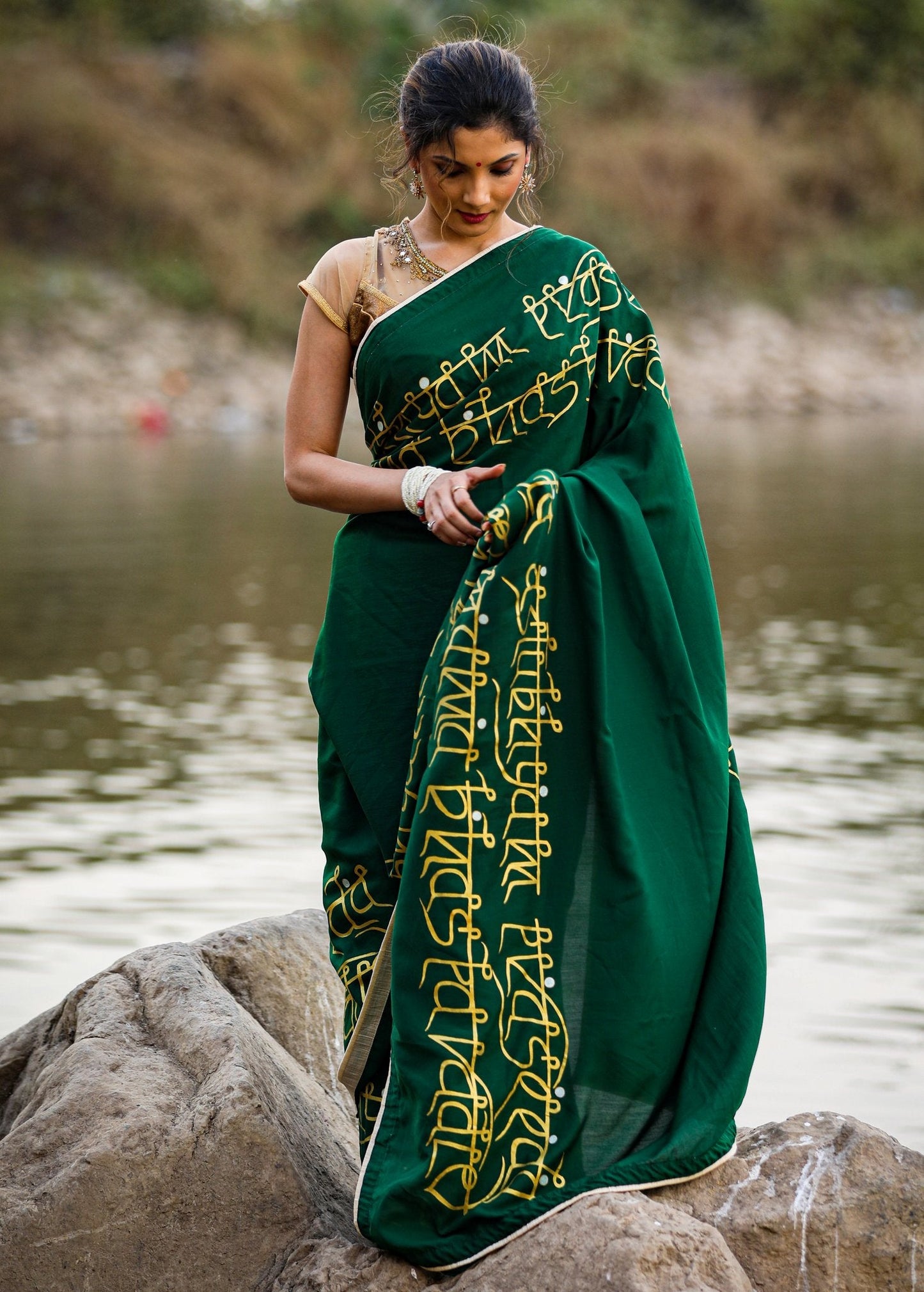 Exclusive forest green hand painted crepe satin saree