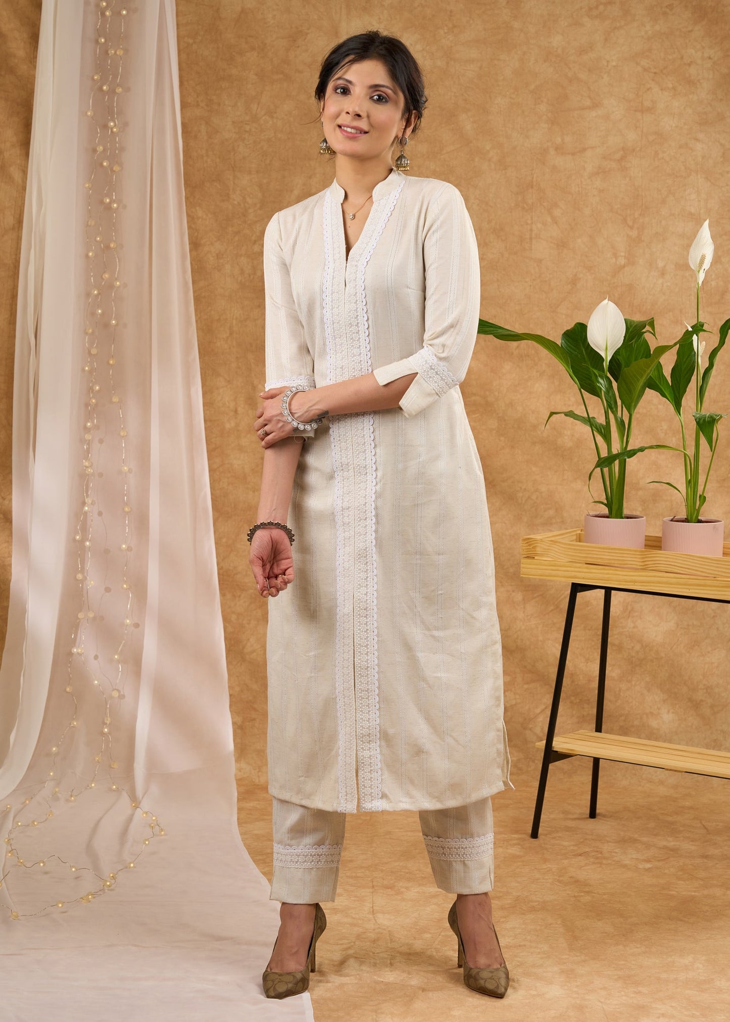 Exclusive self striped cotton kurta with lace Pant optional