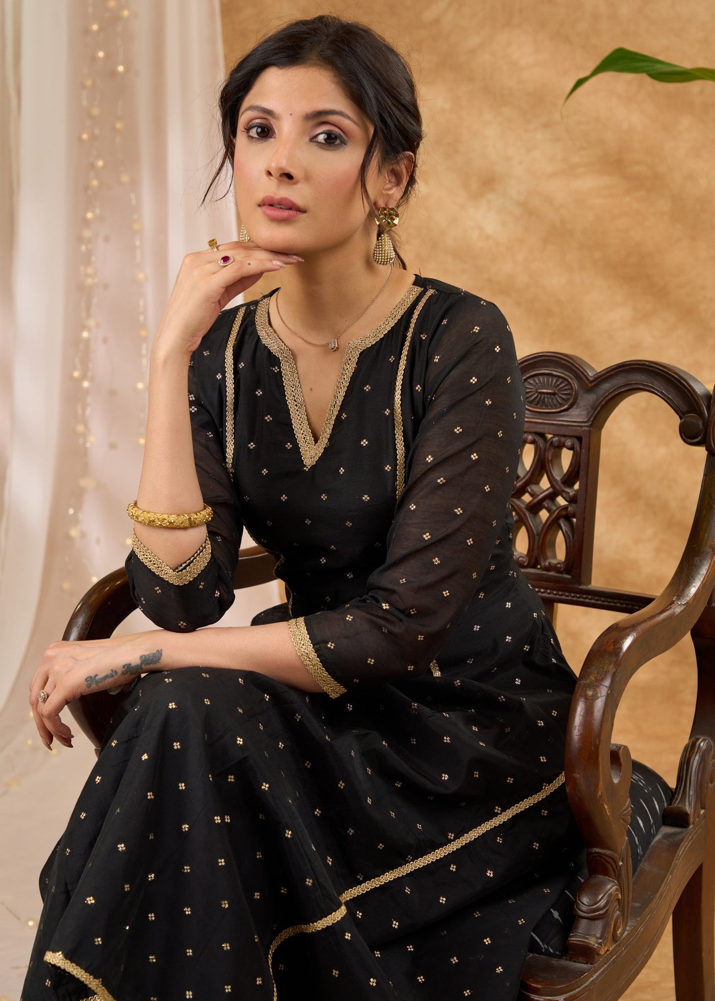 Standout black chanderi with gold embellished A line kurta Pant optional