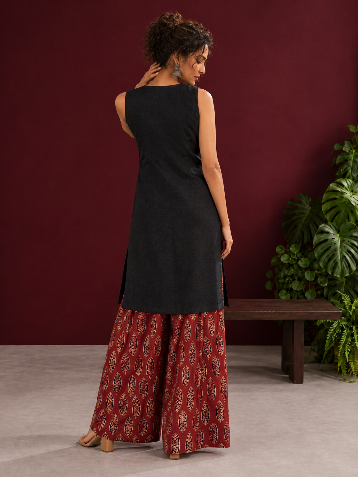 Black Sleeveless Keyhole Neck Tunic Co-Ord Set with Maroon Ajrakh Printed Cotton Farshi Salwar — back view