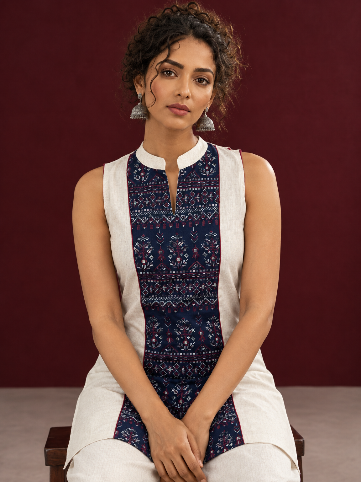 Elegant Off-White Cotton Co-Ord Set with Navy printed Front Panel & Contrast Maroon Piping — seated detail