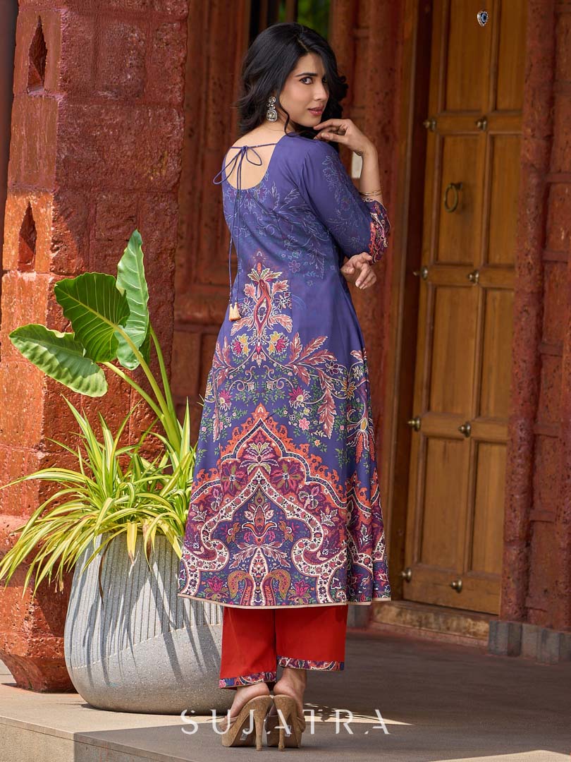 Stunning royal blue printed kurta adorned with handcrafted zardozi and sequin detailing on the keyhole neck.