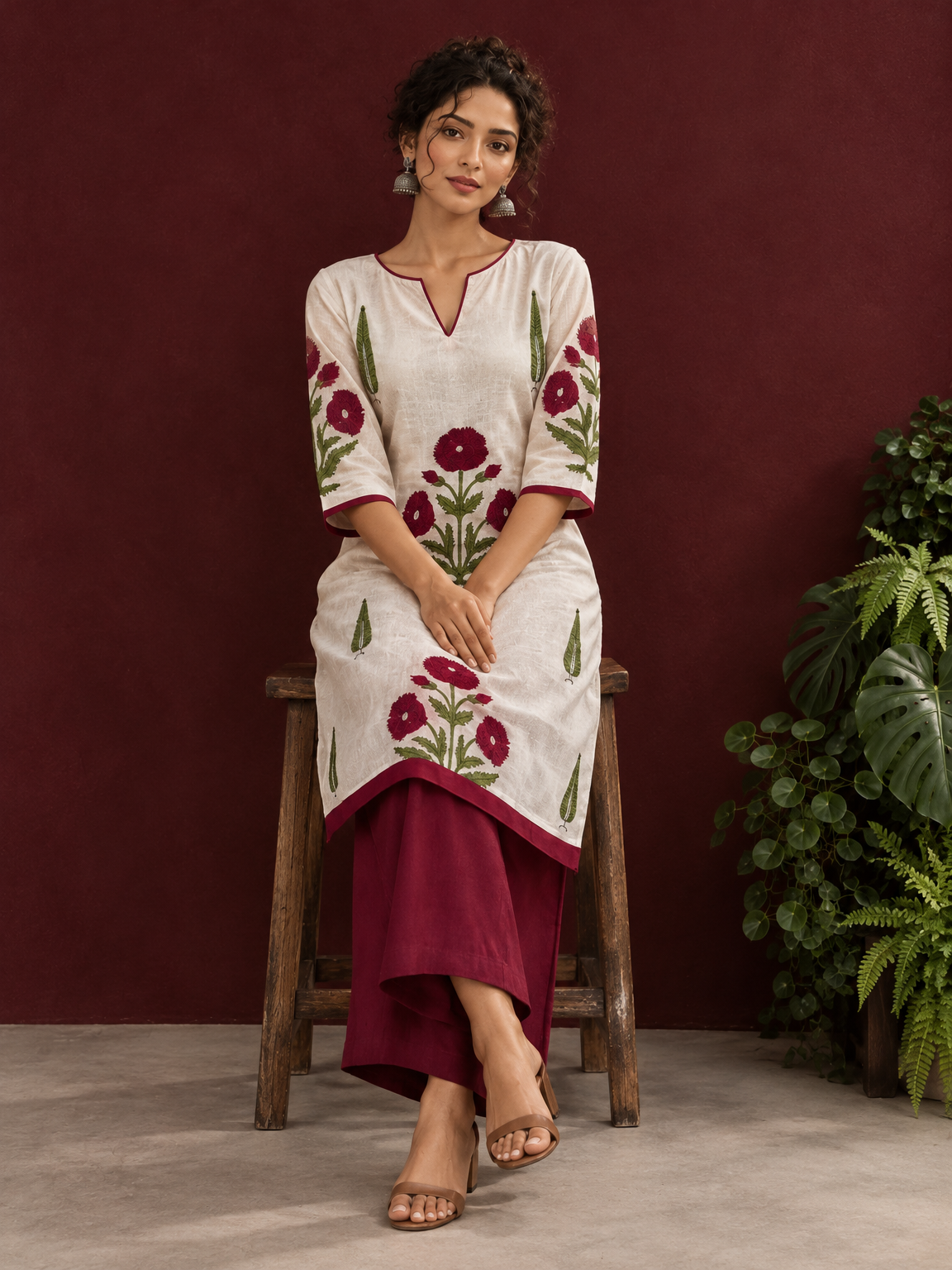 White Cotton Kurta with Hand Block Printed Red Floral Motifs and red Keyhole Neckline Trim — seated