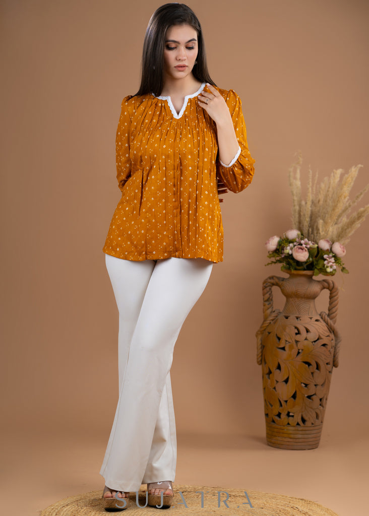 Stylish Mustard Rayon gathered top in bandhani print
