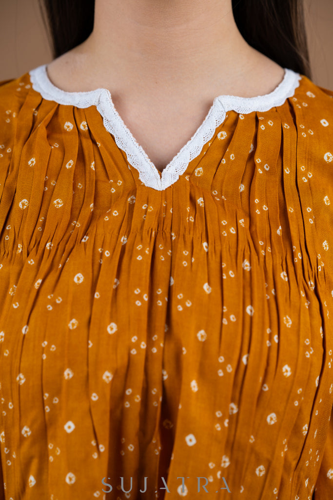 Stylish Mustard Rayon gathered top in bandhani print