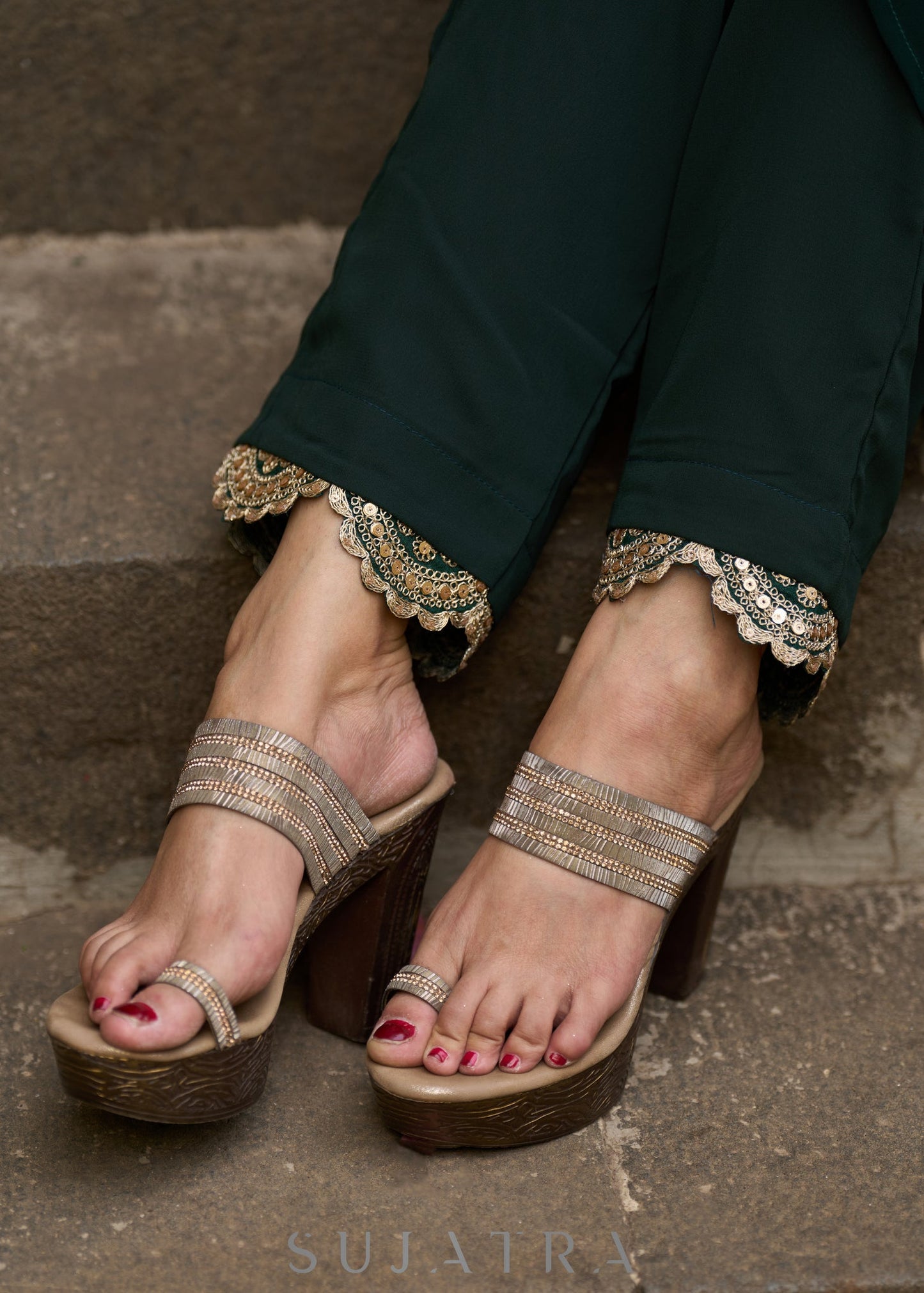 Elegance redefined in this captivating green georgette lace kurta and pant ensemble