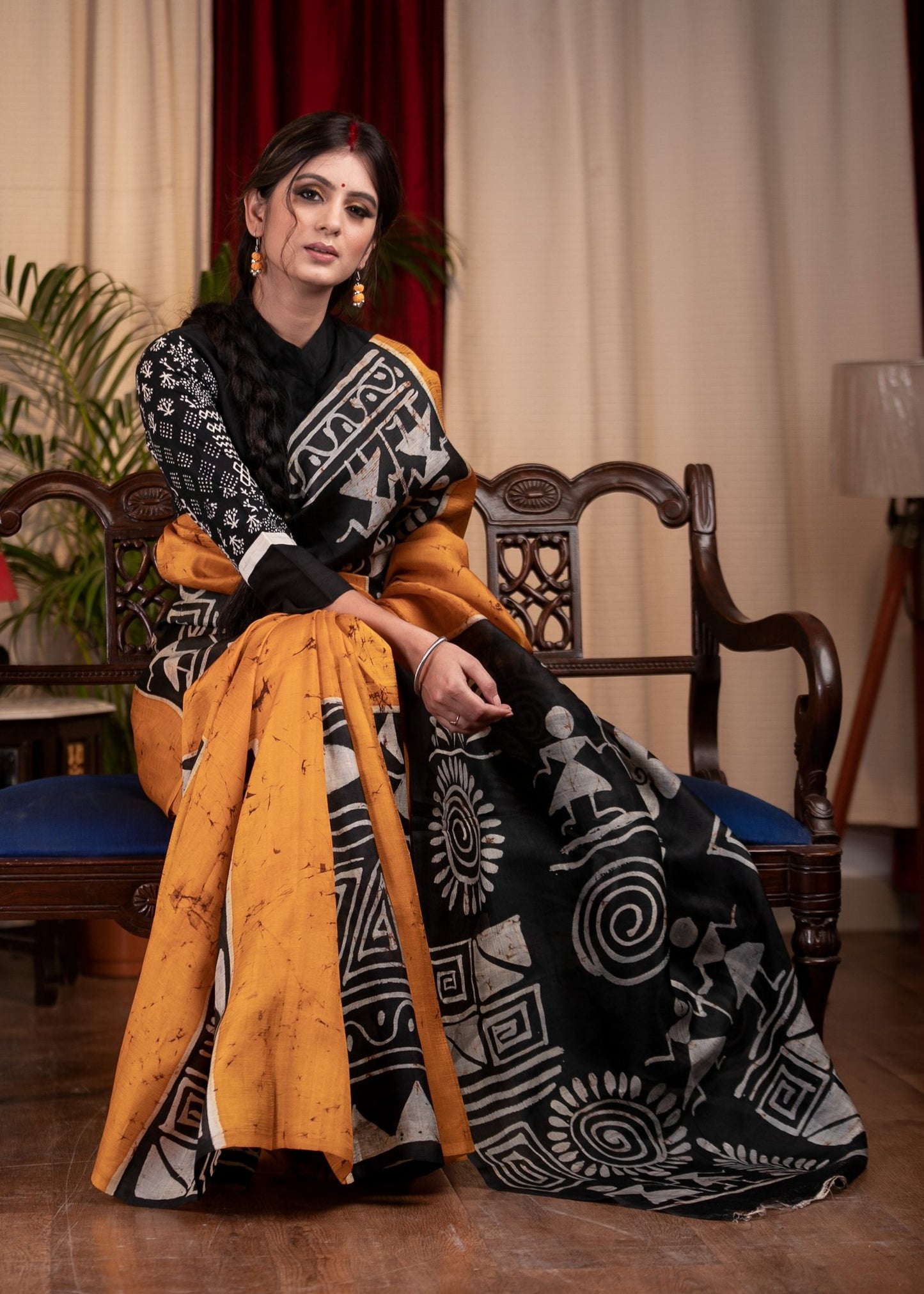 Exclusive pure silk hand batik mustard yellow saree with warli design motifs