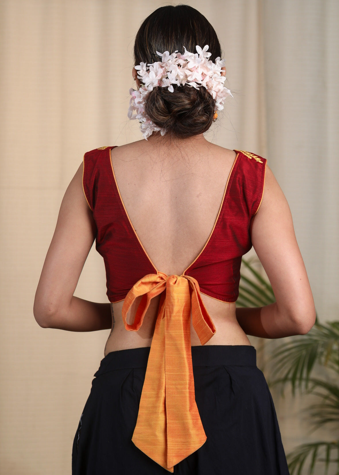 Maroon Cotton Silk Designer Blouse With Scallop Neck line, Contrast Embroidery and Bow At the Back