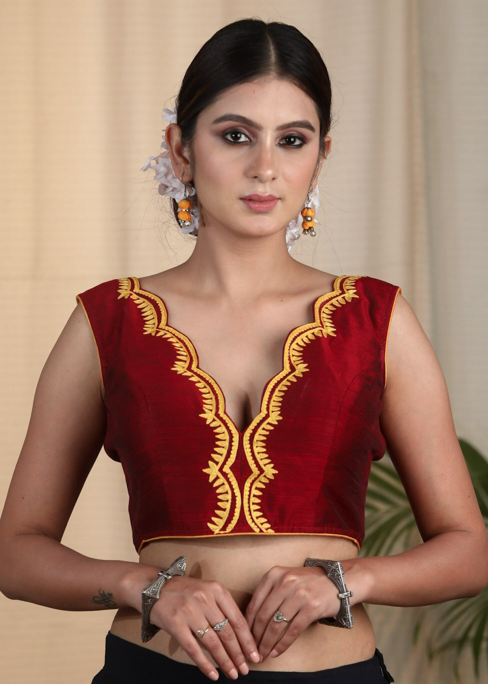 Maroon Cotton Silk Designer Blouse With Scallop Neck line, Contrast Embroidery and Bow At the Back