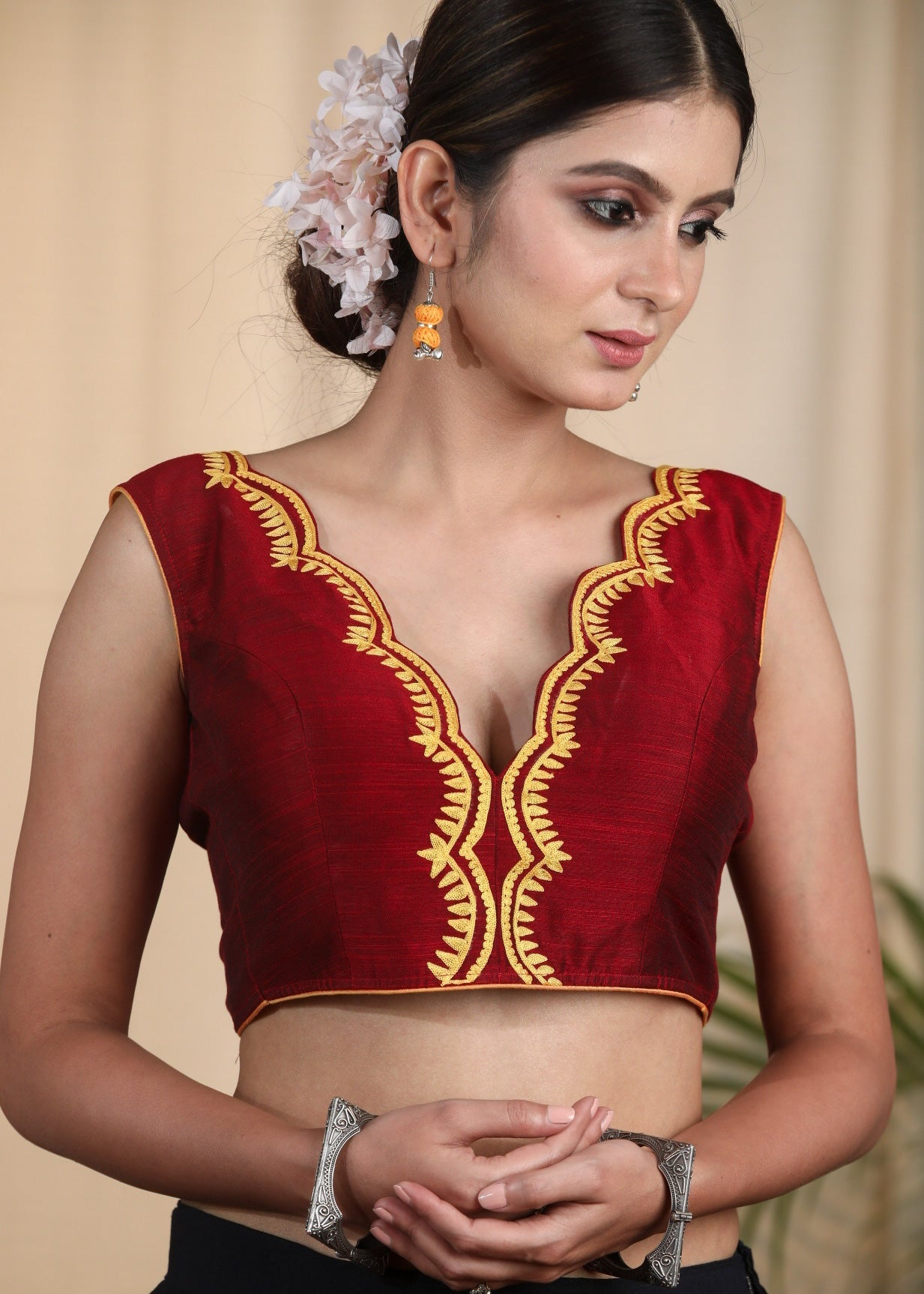 Maroon Cotton Silk Designer Blouse With Scallop Neck line, Contrast Embroidery and Bow At the Back