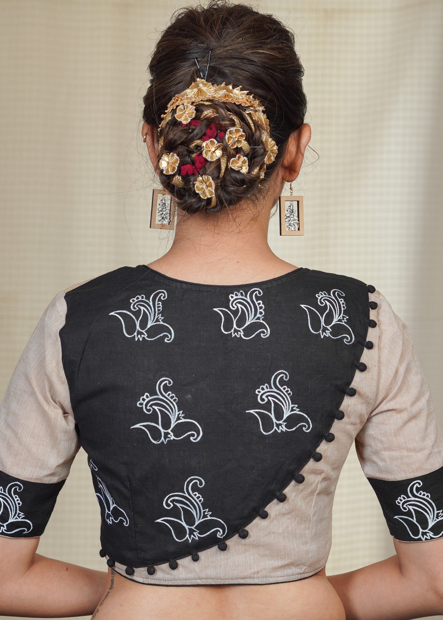 Beige Handloom Cotton Blouse With Hand Painted Motifs at the Back and sleeves and potli work